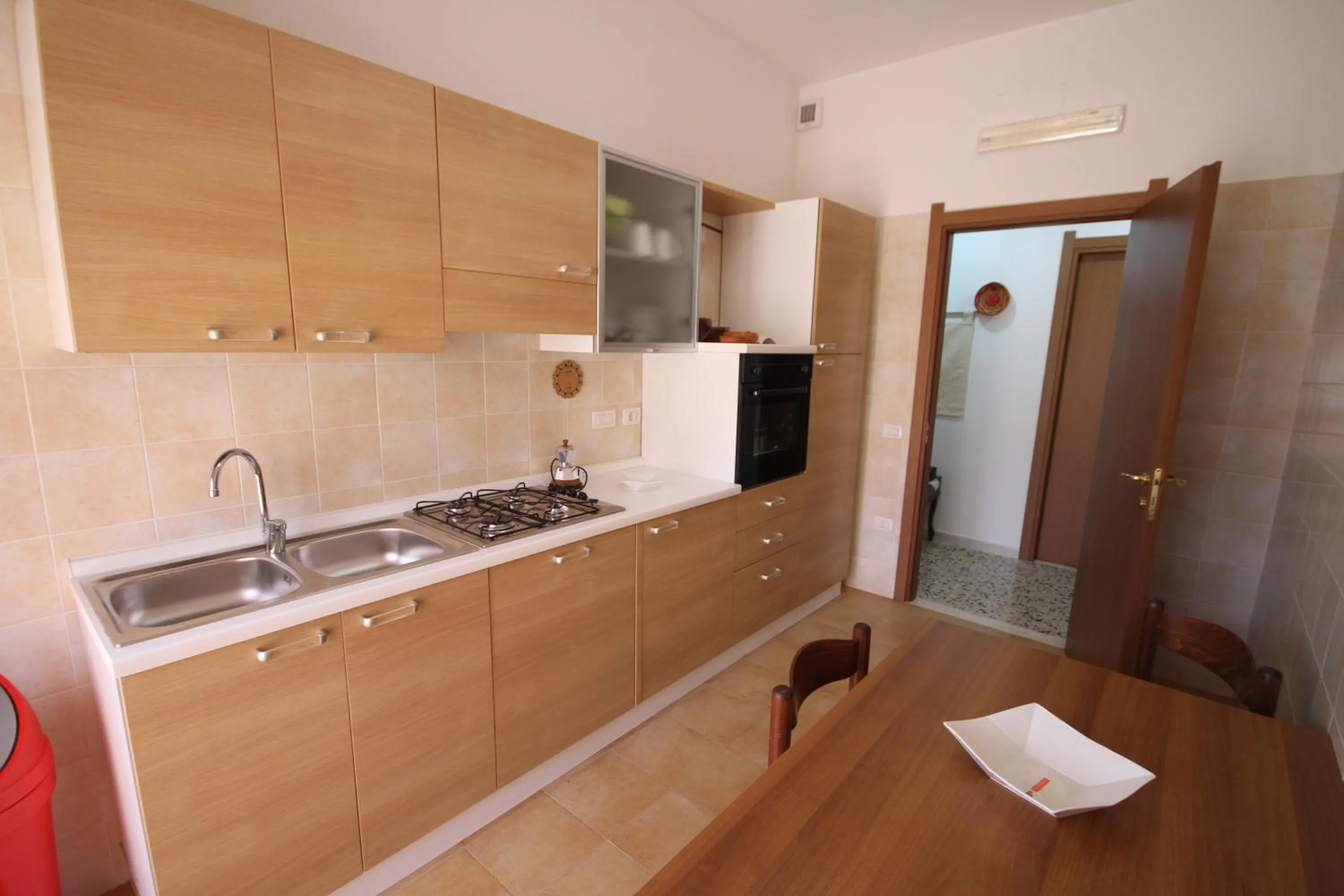Kitchen or kitchenette in B&B Santa Gilla