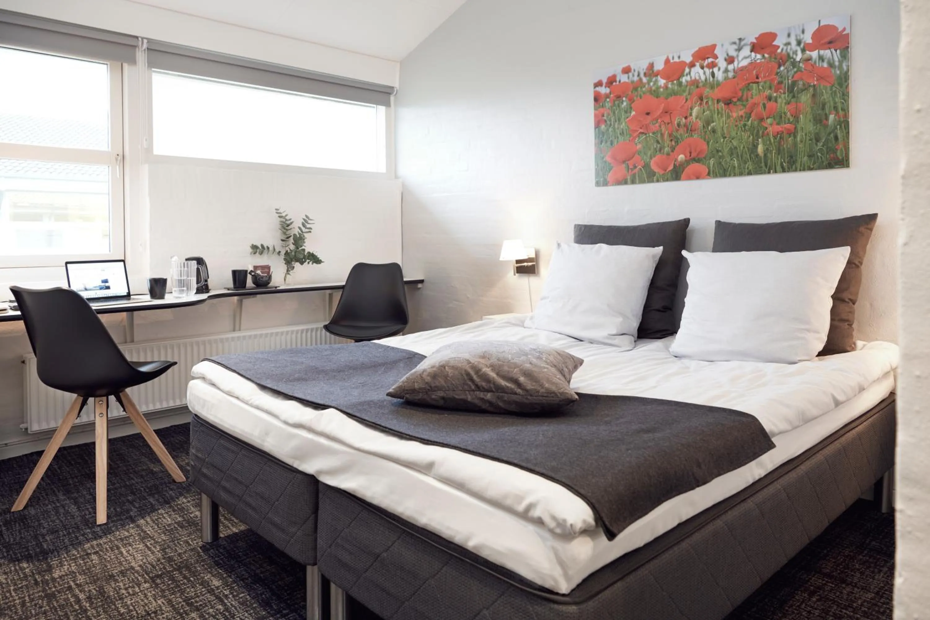 Bed in HORISONT Hotel & Konference