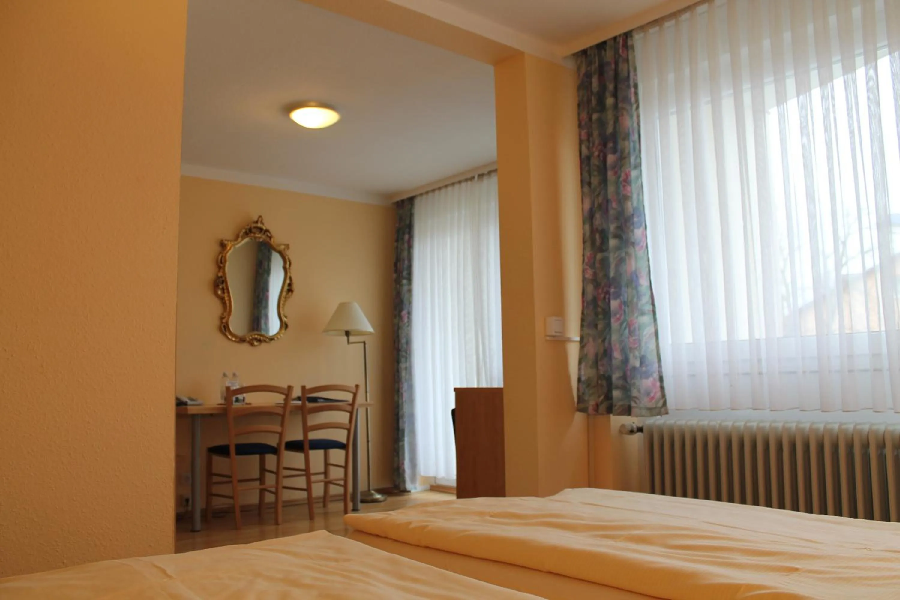 Seating area, Bed in Hotel Brigitte