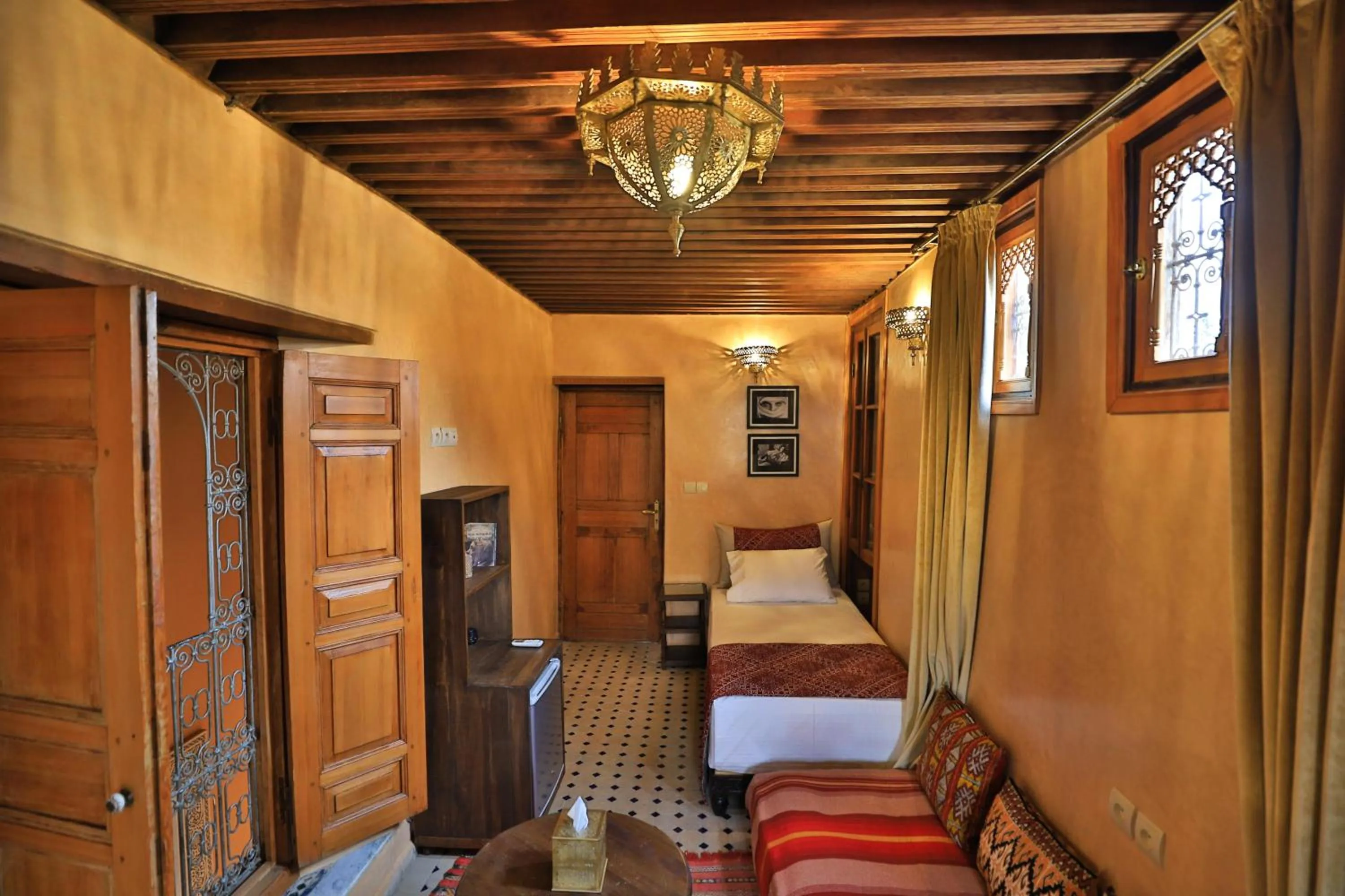 Bed in Riad Moulaydriss et Giacomo