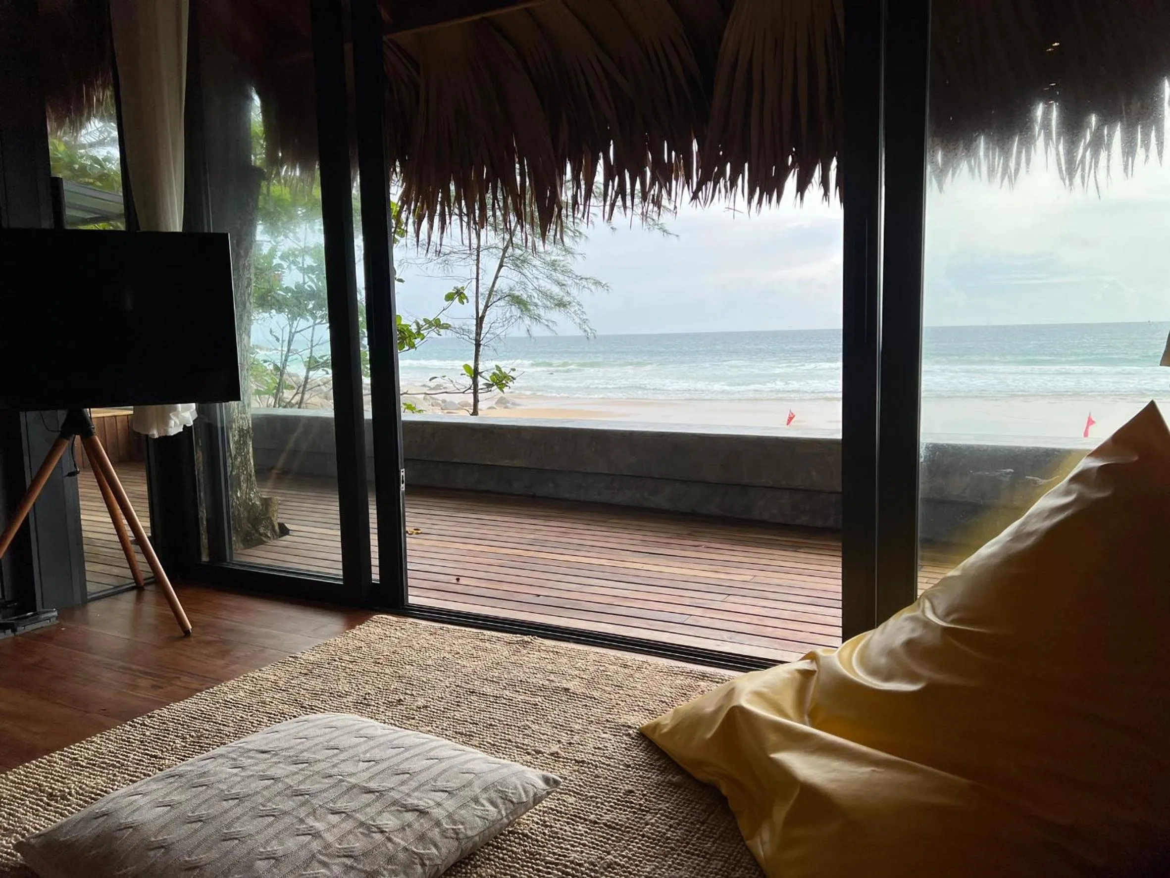 Communal lounge/ TV room in Sealord Naithon Beachfront Villa