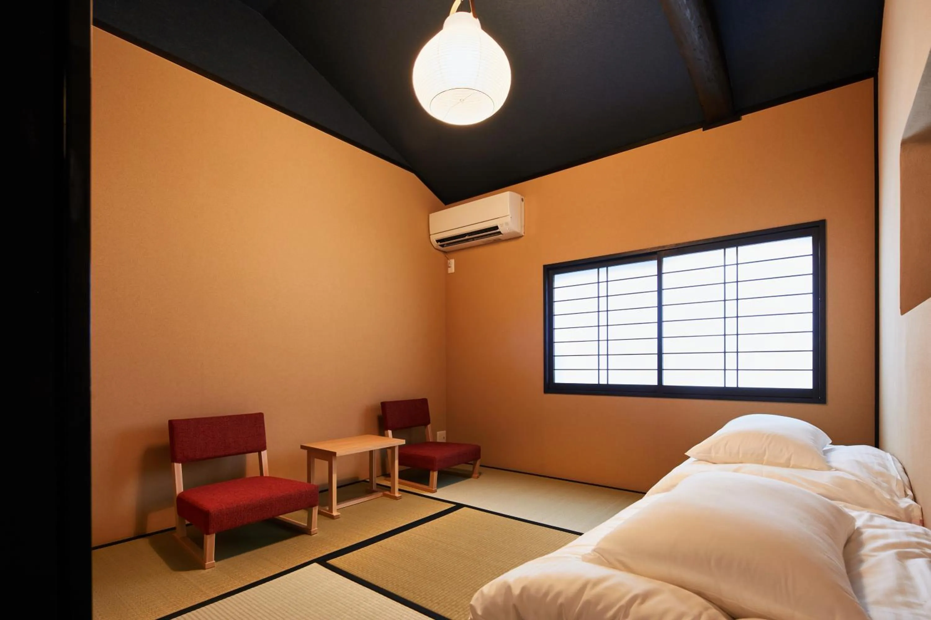 Bedroom, Bed in TSUBOMI luxury Inn Shimabara Bettei 1