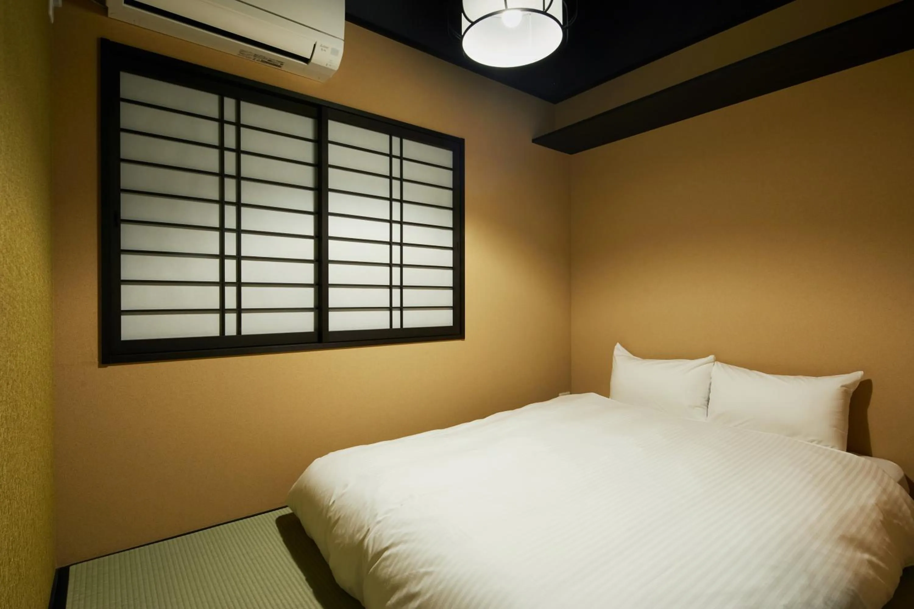 Bedroom, Bed in TSUBOMI luxury Inn Shimabara Bettei 2