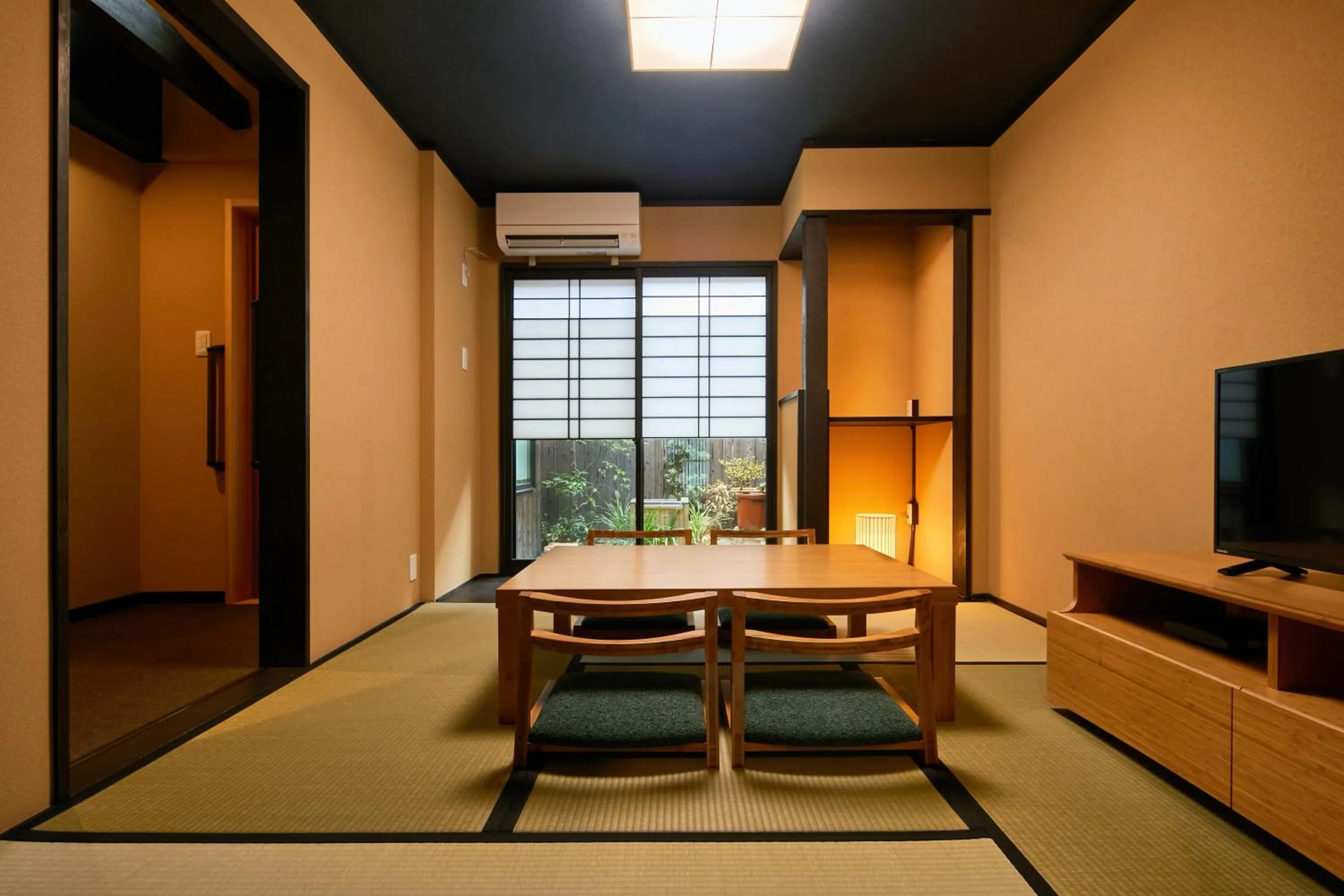 Living room in TSUBOMI luxury Inn Shimabara Bettei 3