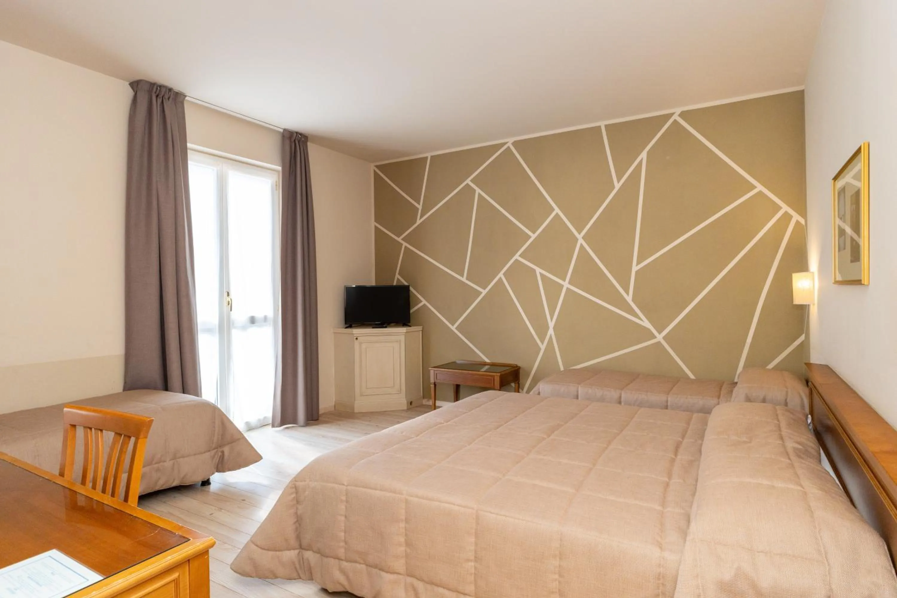 Bed in Hotel Valentino