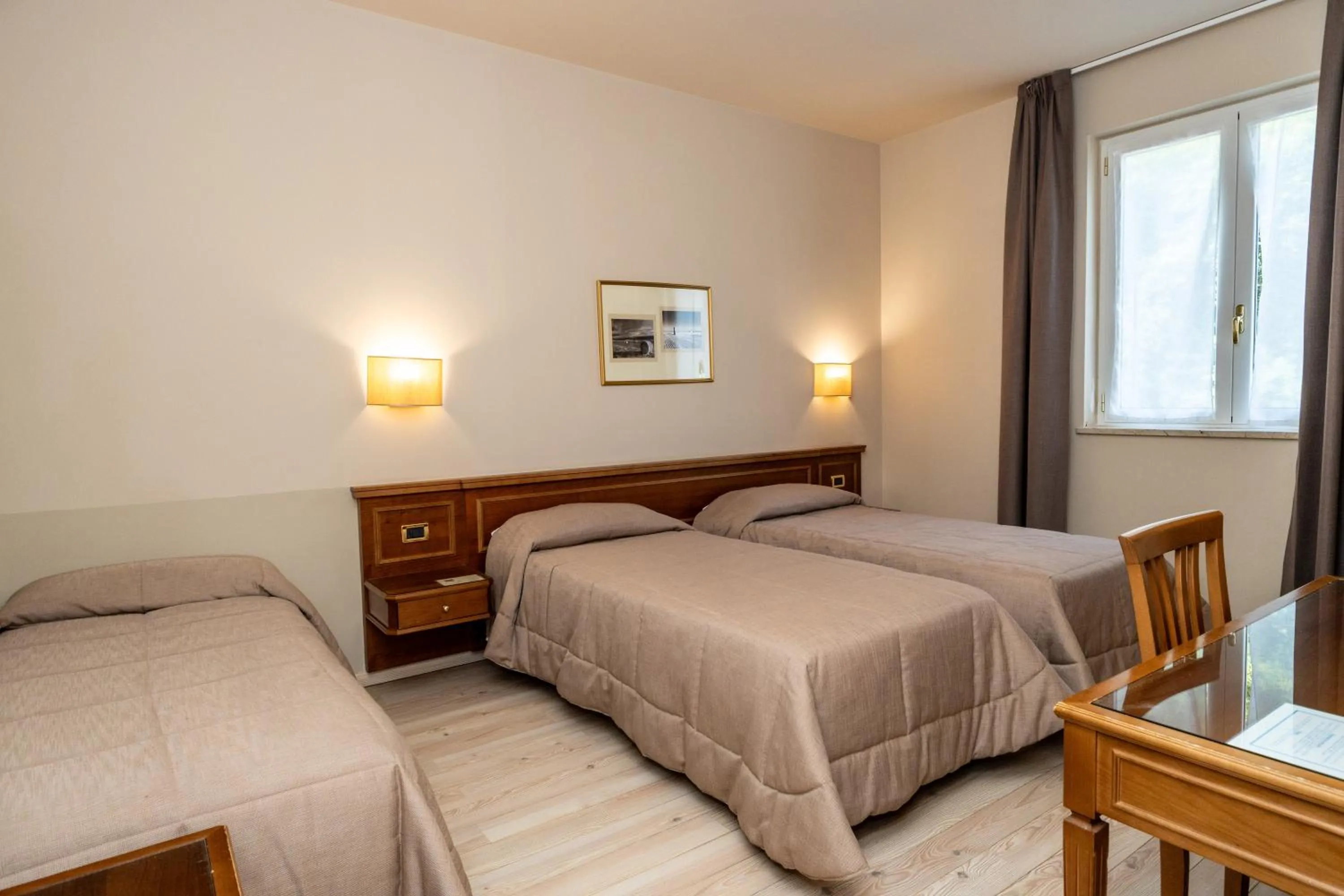 Bed in Hotel Valentino