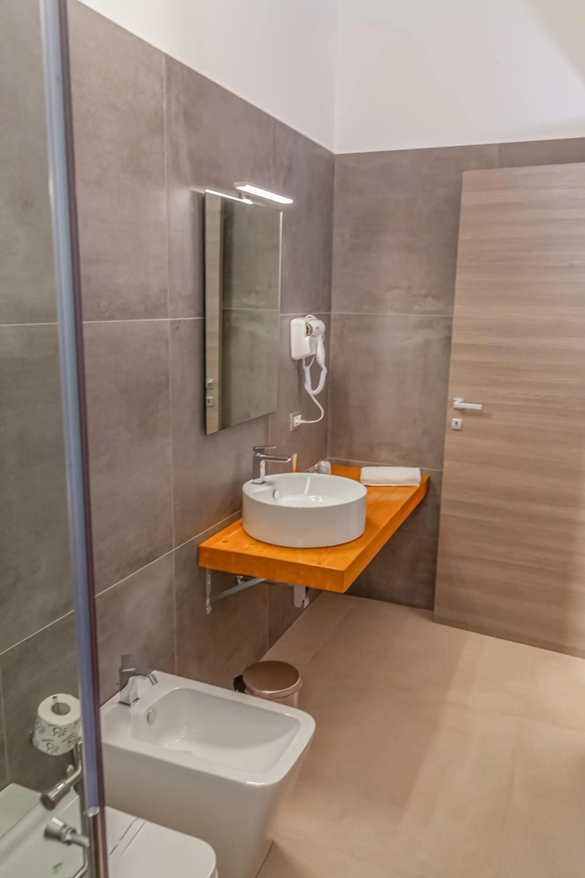 Bathroom in Isgrò Rooms