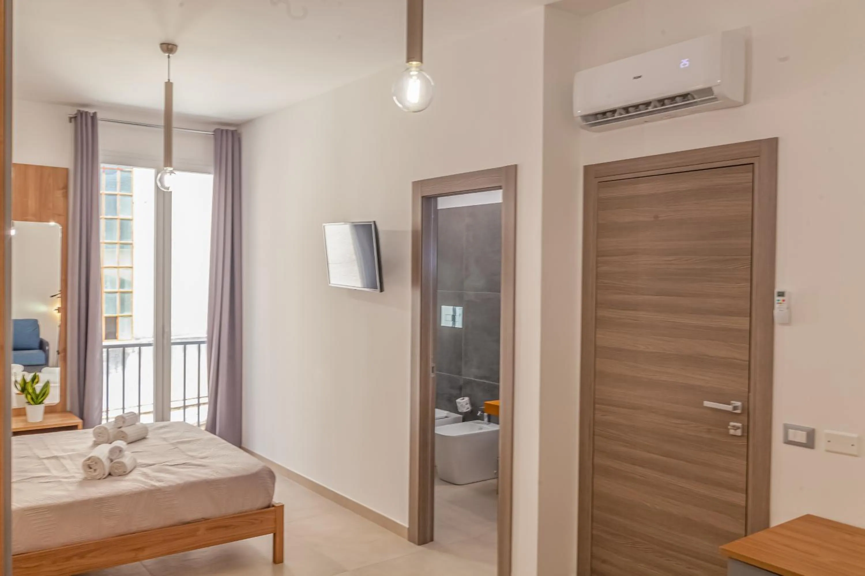 Bedroom in Isgrò Rooms