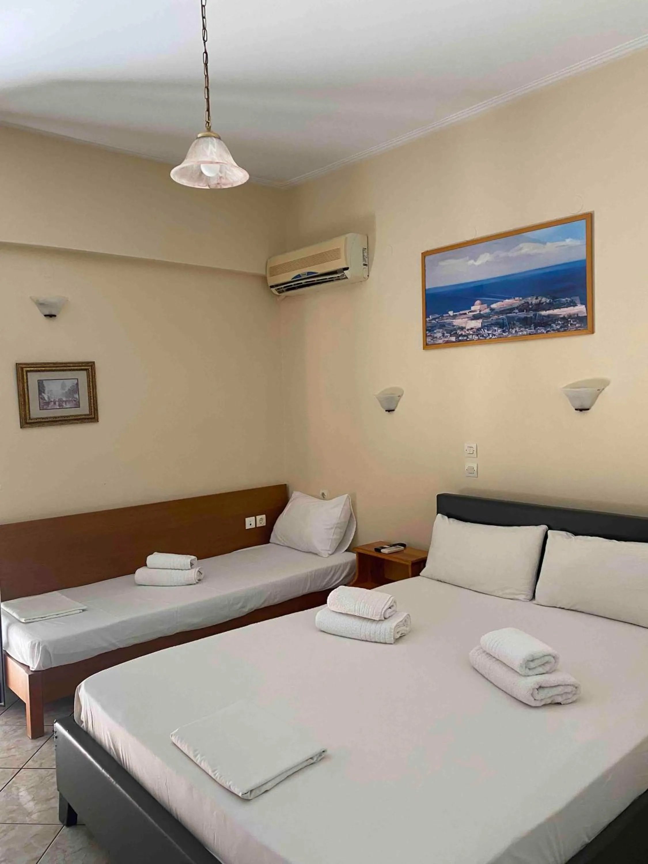 Bed in Eliza Apartments