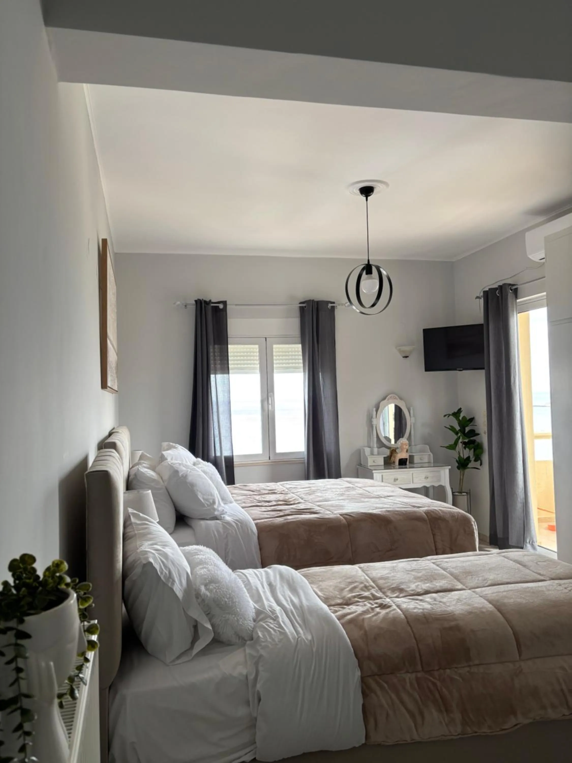 Bed in Eliza Apartments