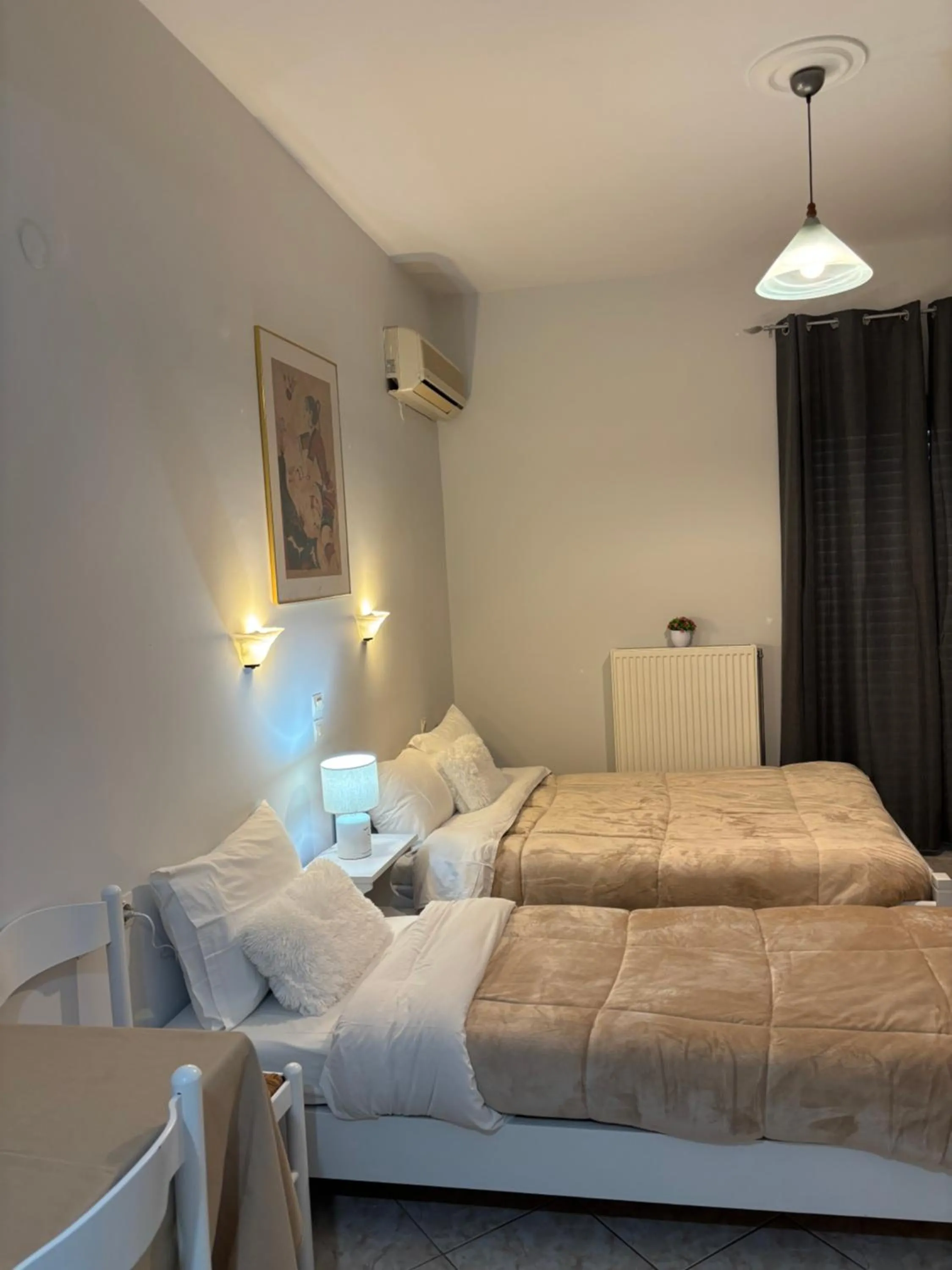 Bed in Eliza Apartments