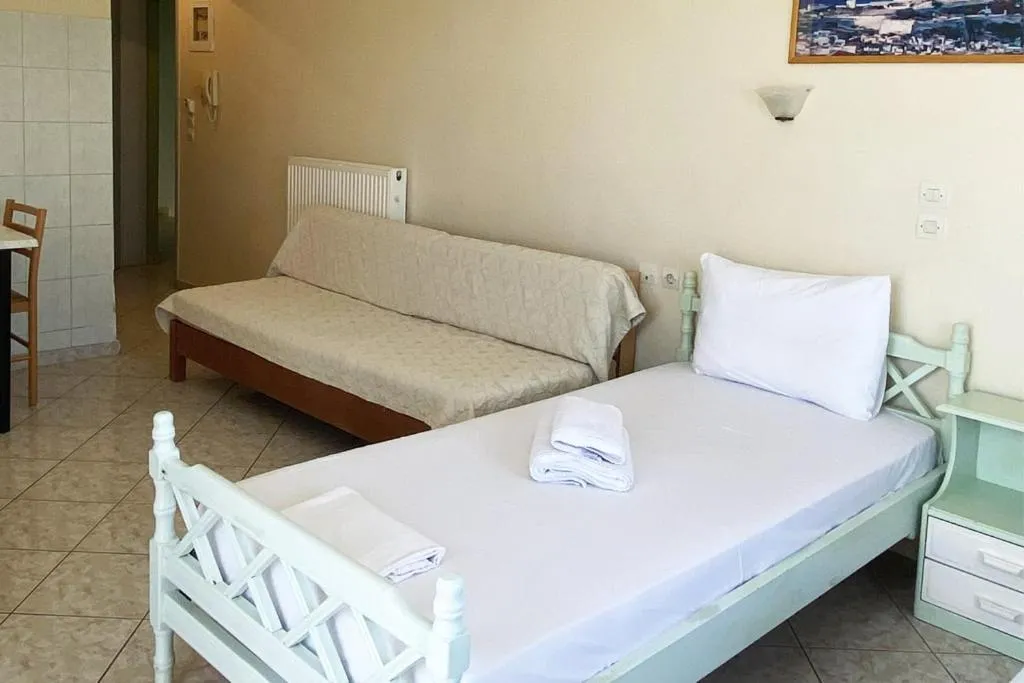 Bed in Eliza Apartments