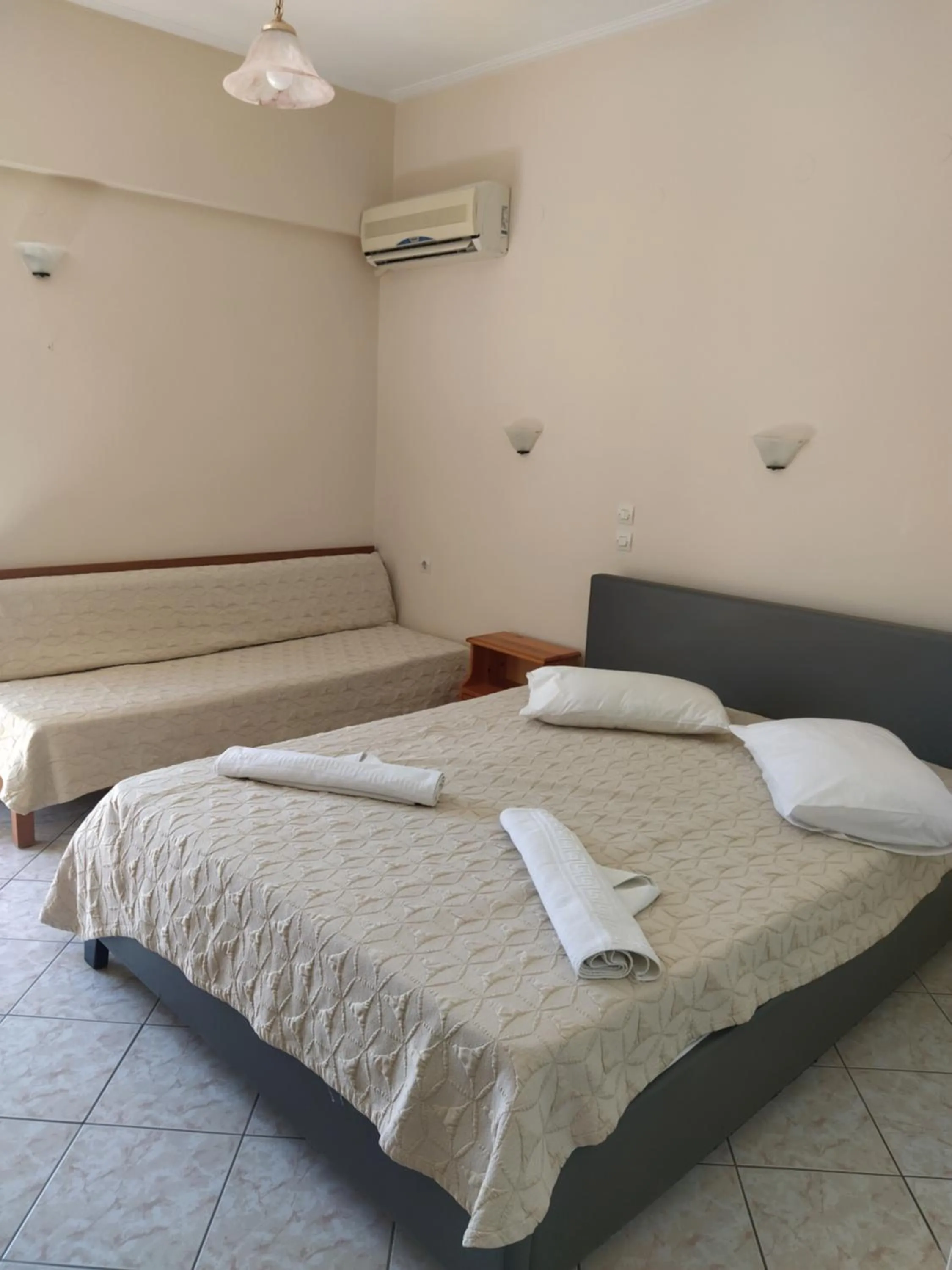 Bed in Eliza Apartments