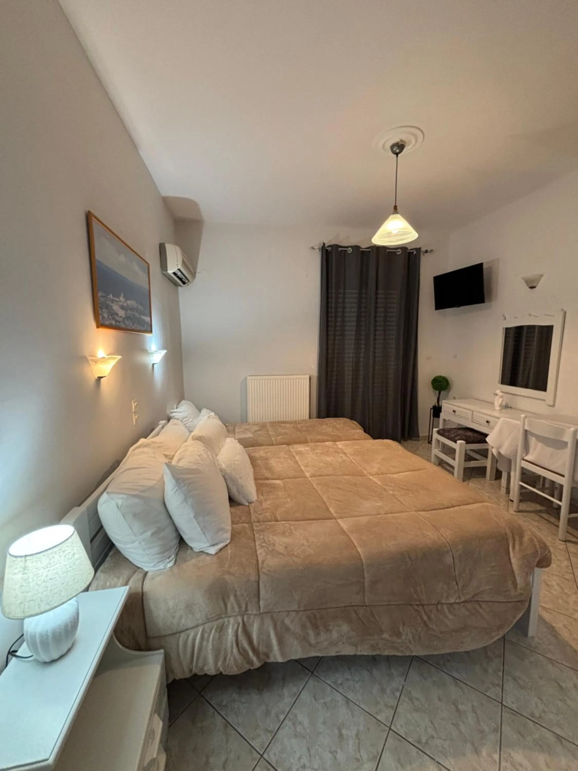Bed in Eliza Apartments