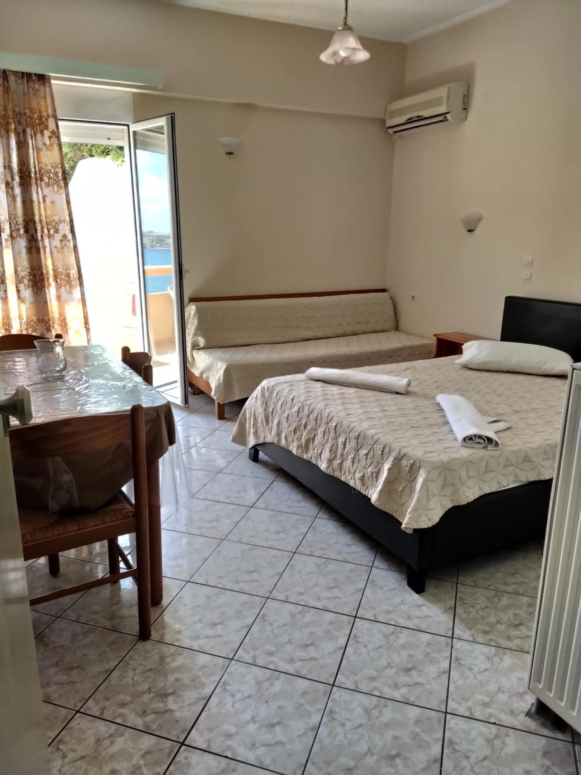Bed in Eliza Apartments