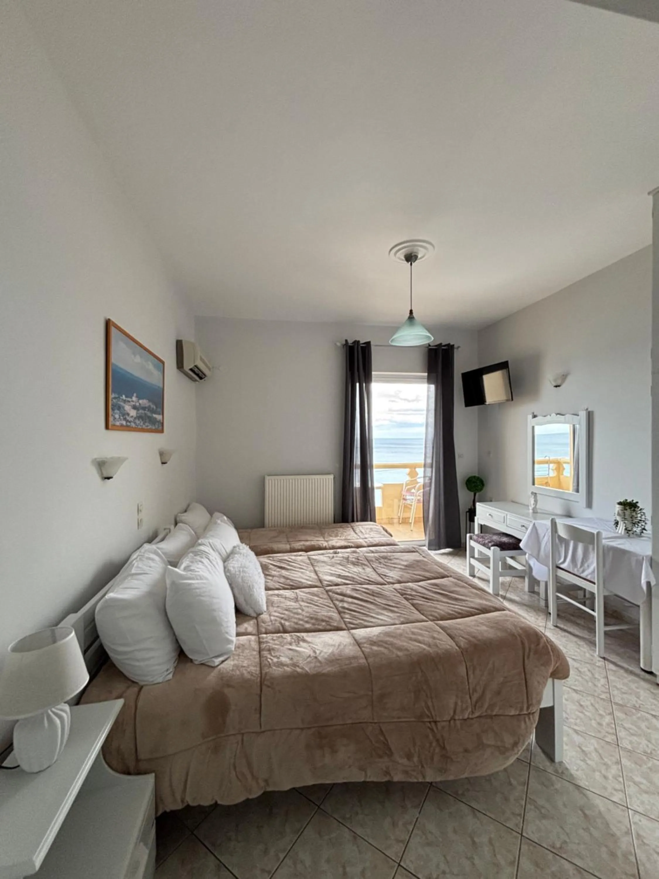 Bed in Eliza Apartments