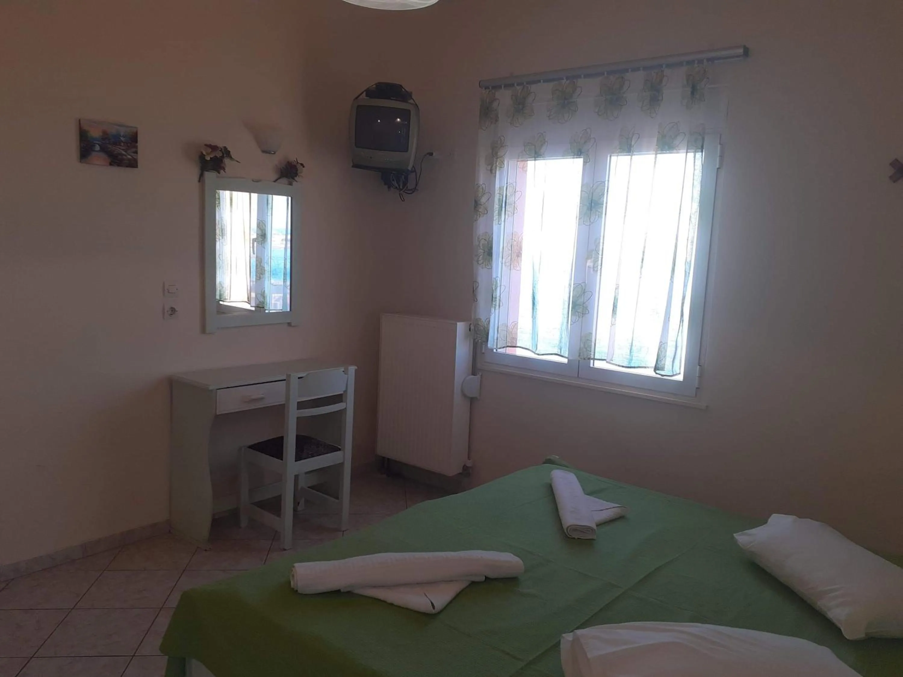 Bed in Eliza Apartments