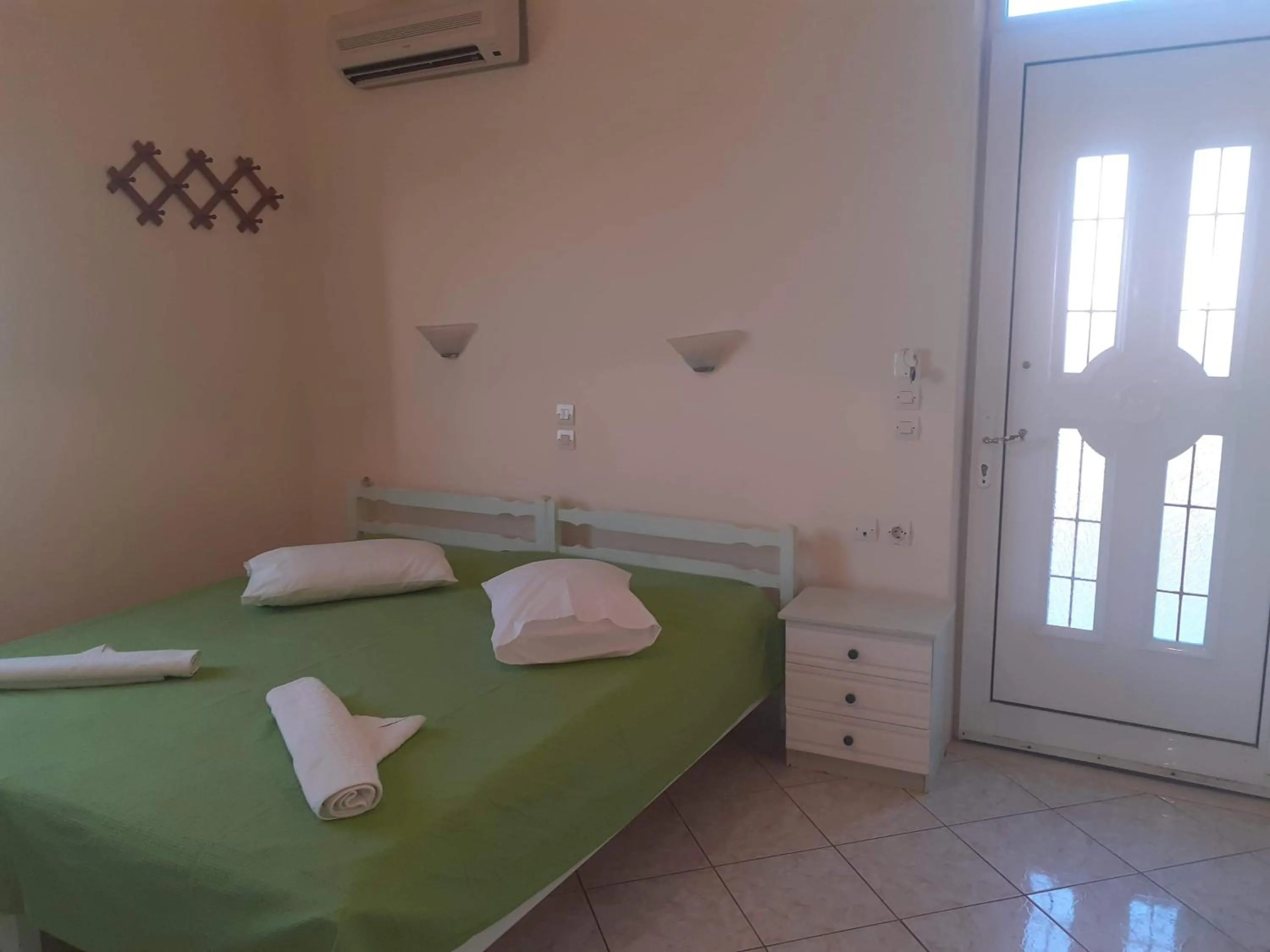 Bed in Eliza Apartments
