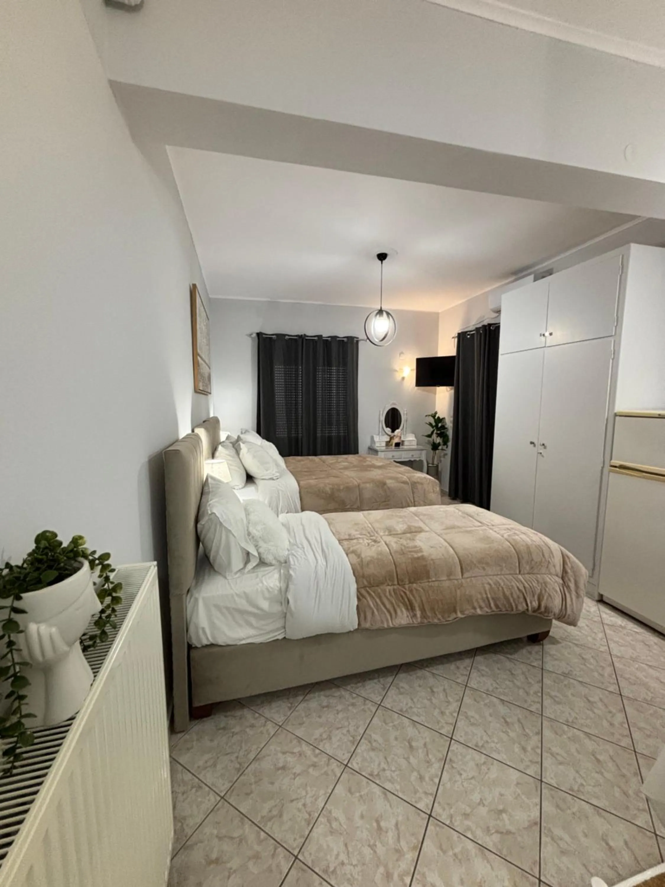 Bed in Eliza Apartments