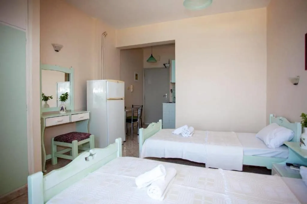 Bed in Eliza Apartments