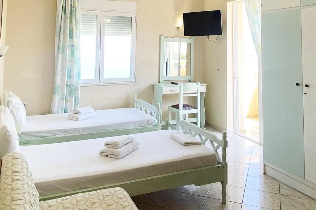 Bed in Eliza Apartments