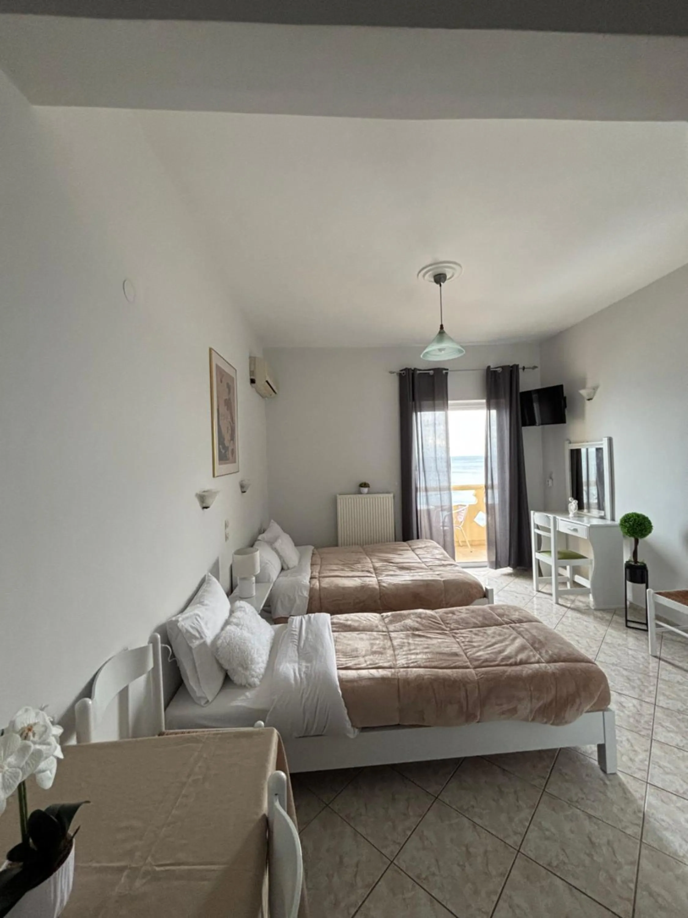 Bed in Eliza Apartments