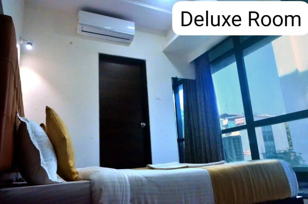 Bed in THE BEST HOTEL MUMBAI