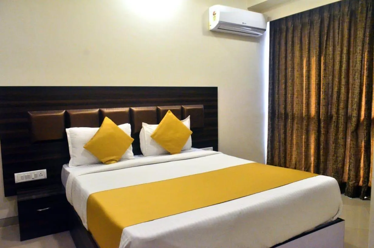 Bed in THE BEST HOTEL MUMBAI