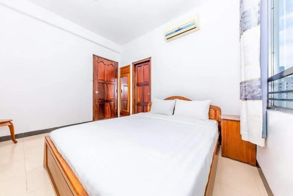 Bed in Minh Cat Hotel