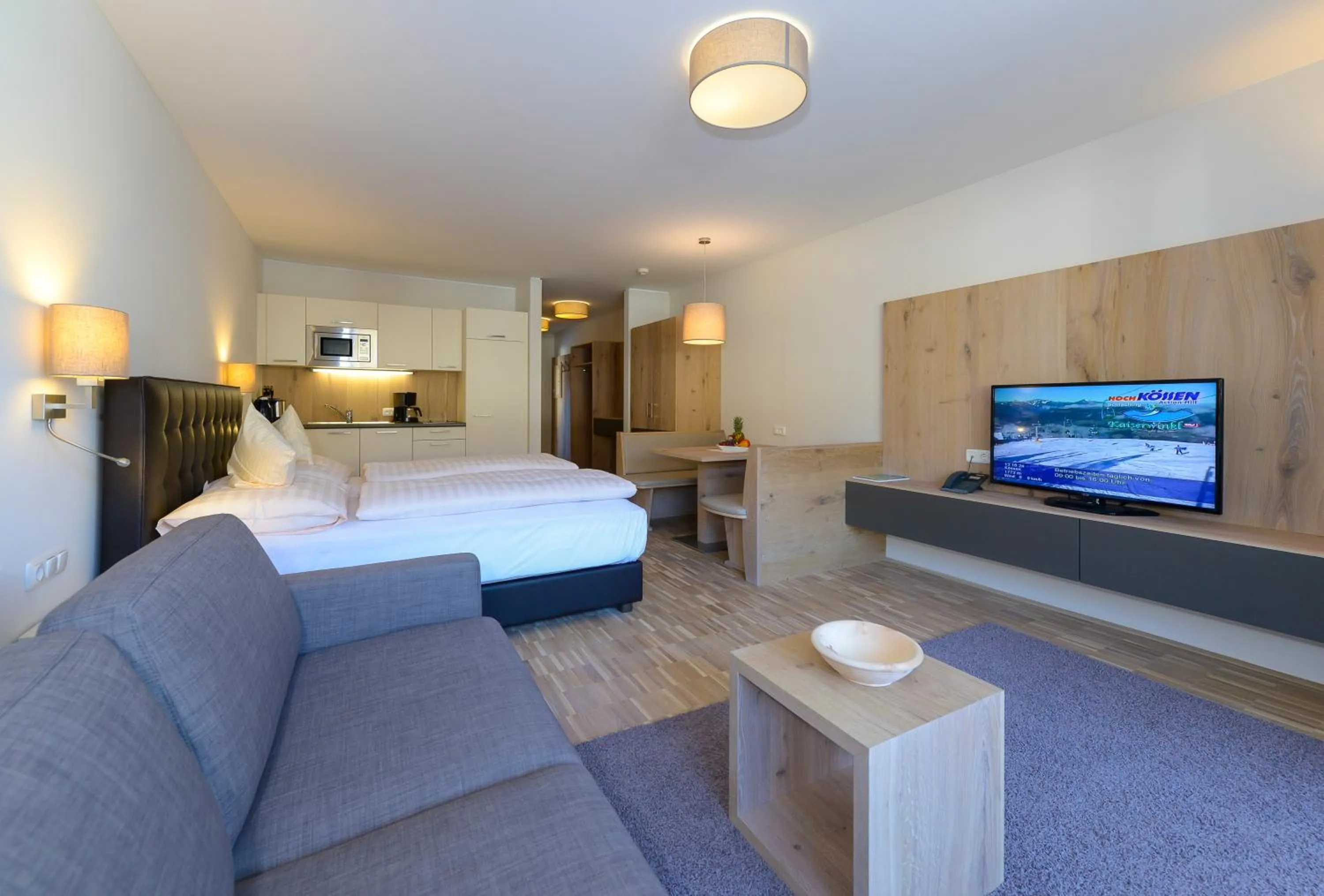 Kitchen or kitchenette, Bed in Appartementhotel Sonnenhof