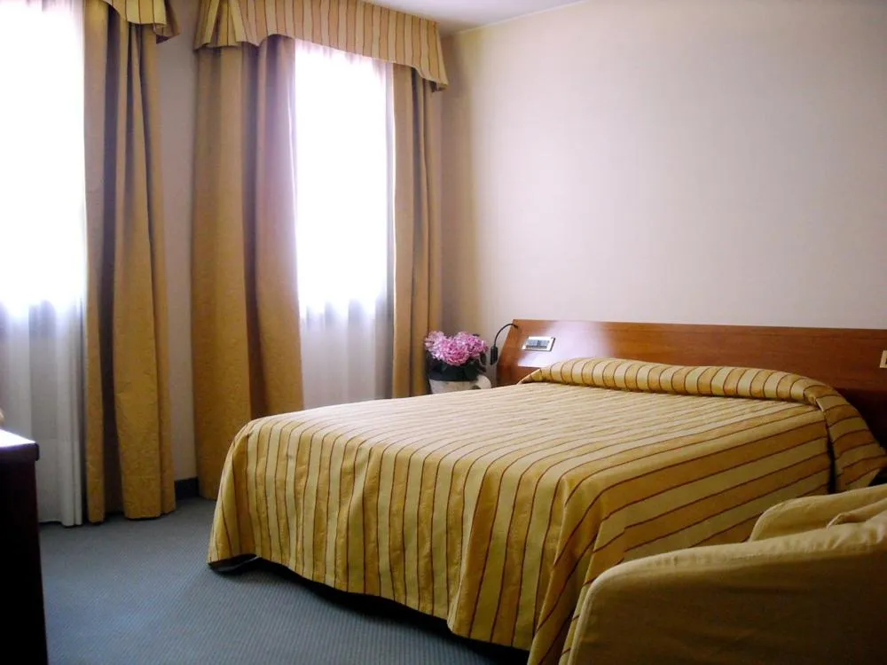 Bed in Hotel Villa Monica