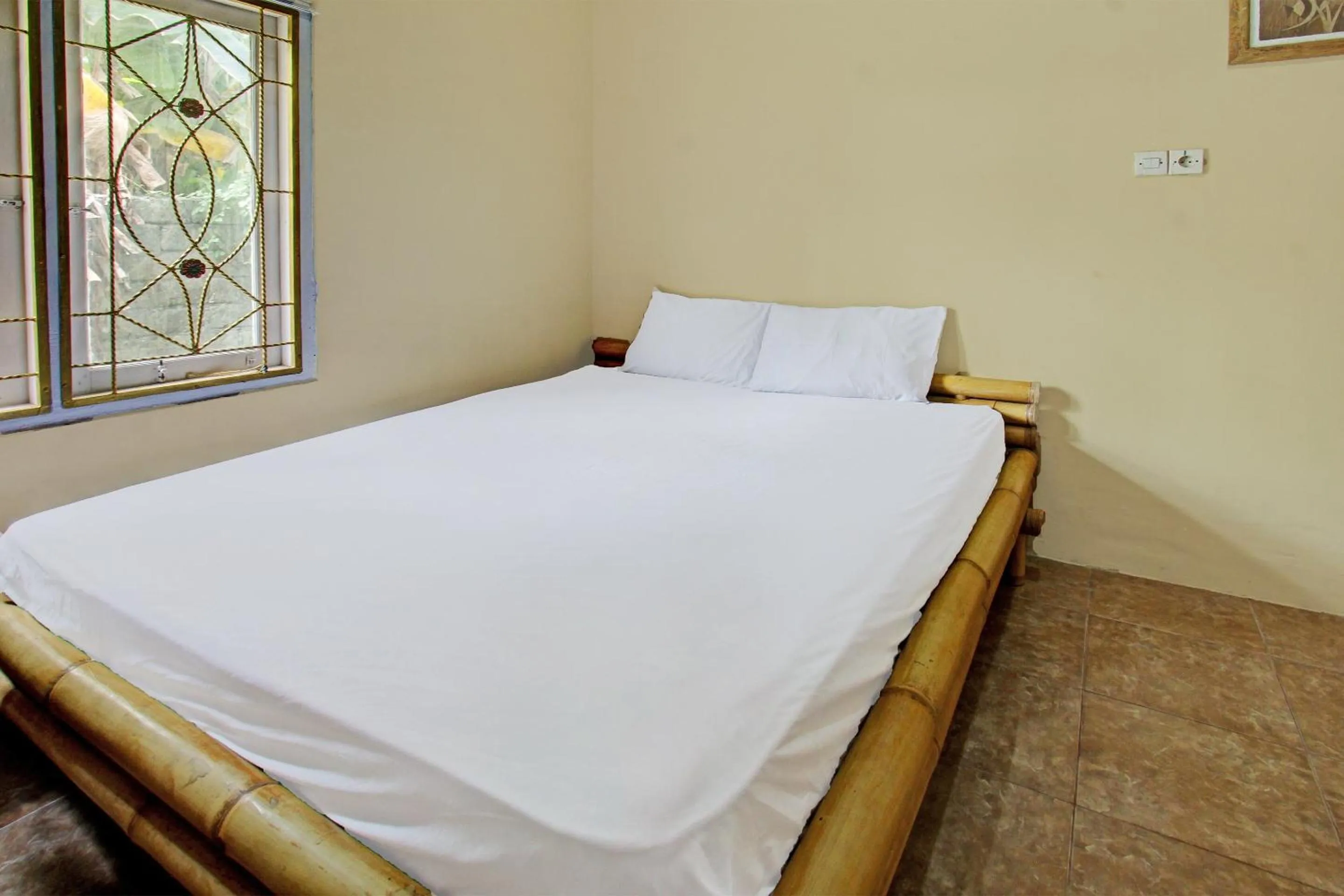 Bedroom, Bed in Hotel O Zahira Homestay Near Ekas Surf School and Service