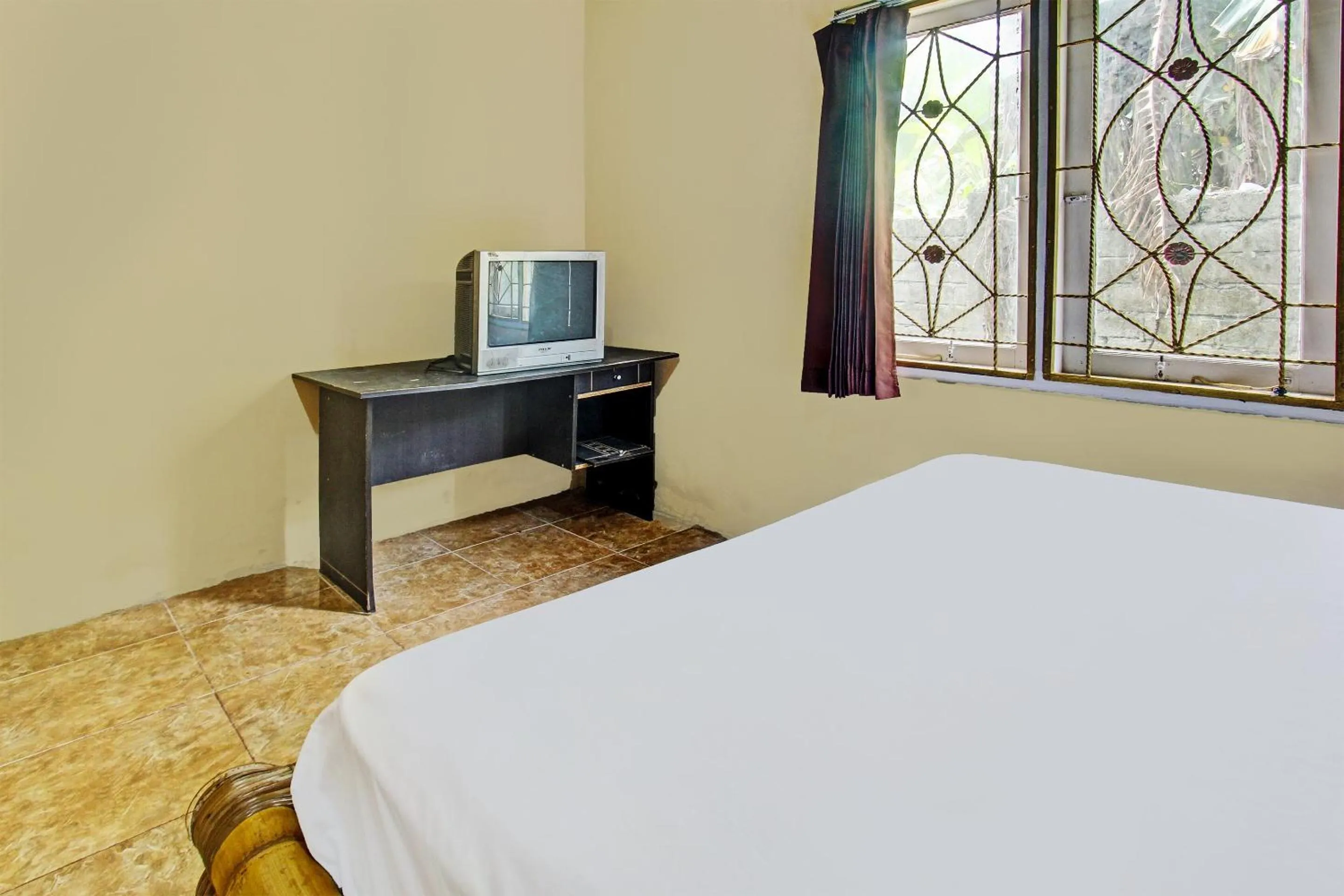 Bedroom, Bed in Hotel O Zahira Homestay Near Ekas Surf School and Service