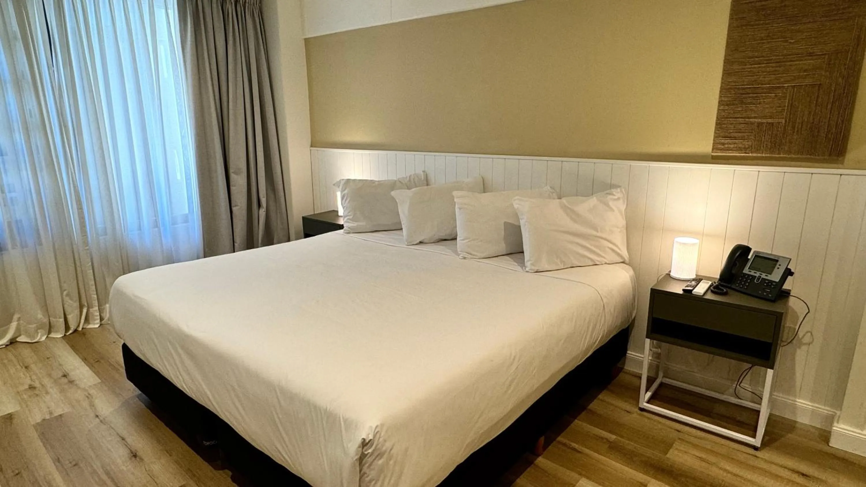 Bed in Gardi Hotel & Suites