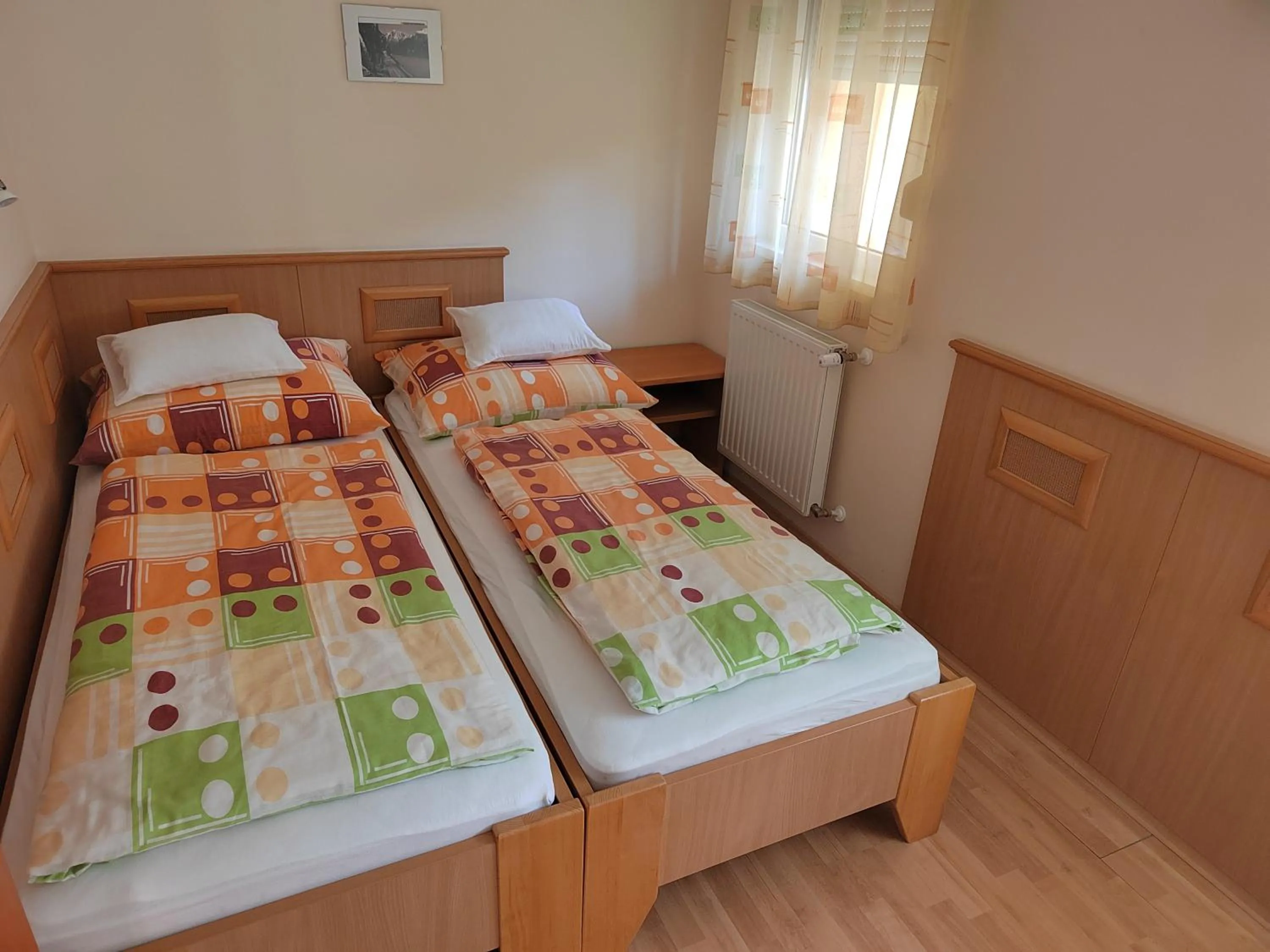 Bed in Garda Wellness Apartmanház