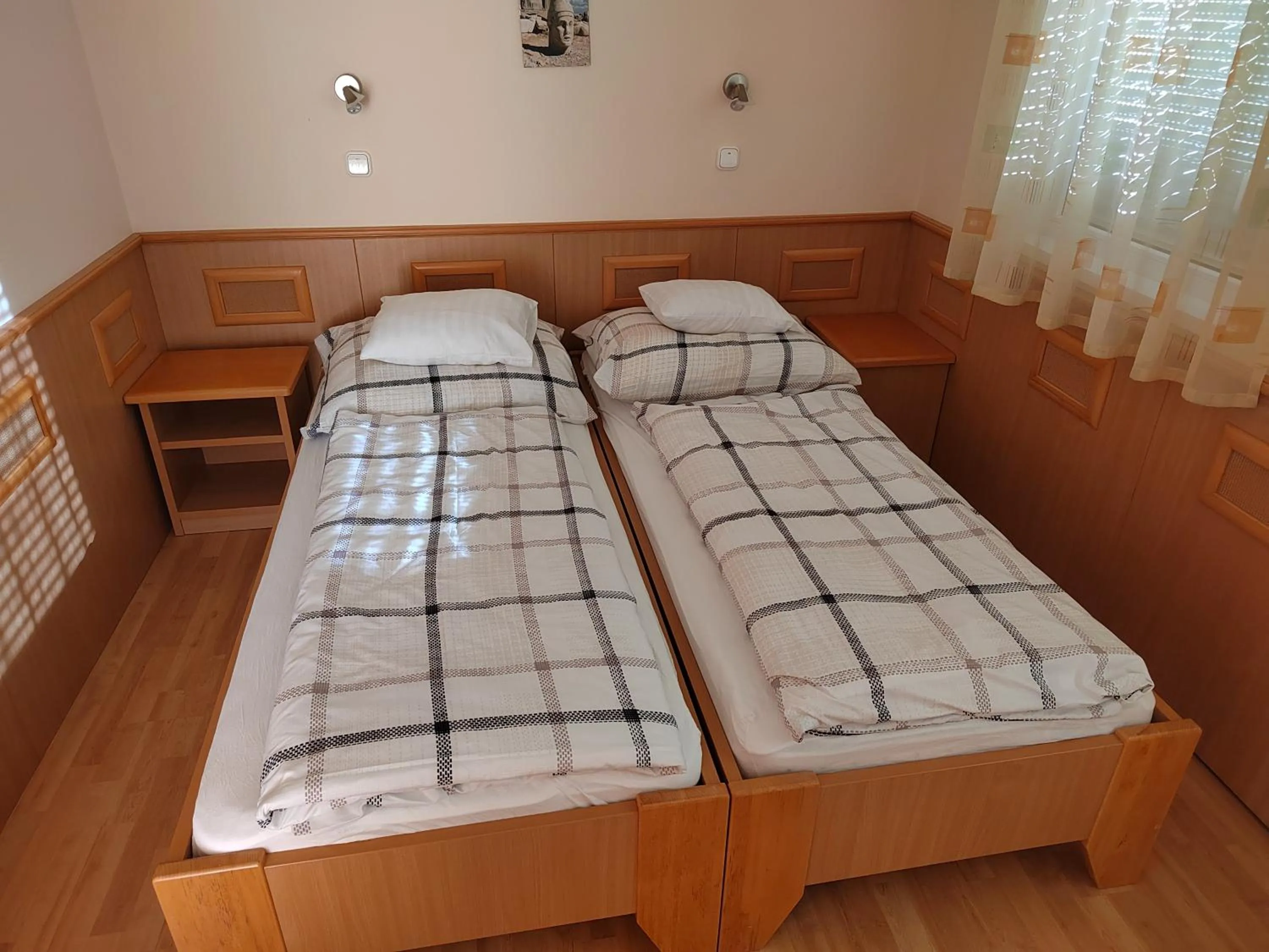 Bed in Garda Wellness Apartmanház