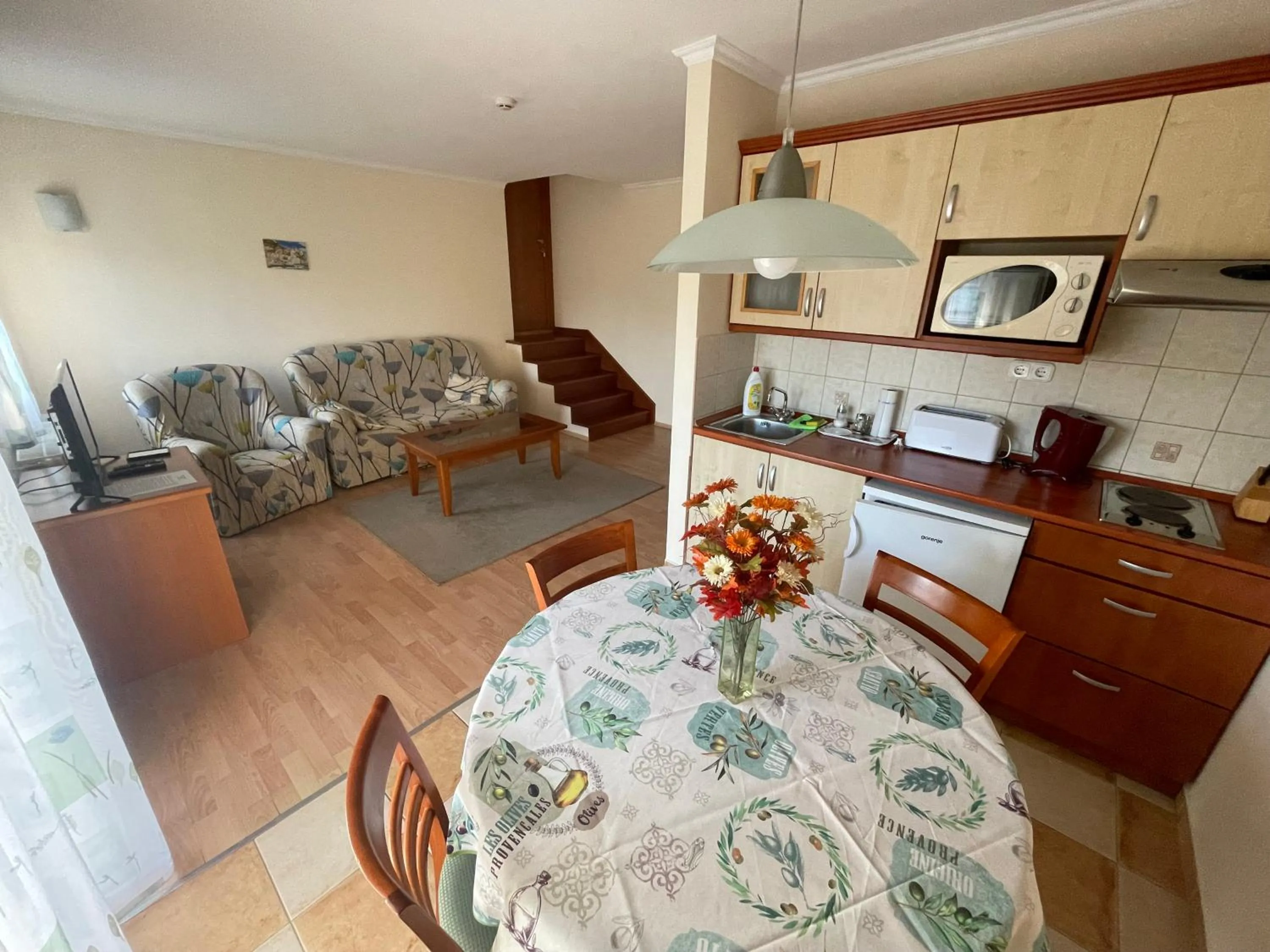 Kitchen or kitchenette in Garda Wellness Apartmanház