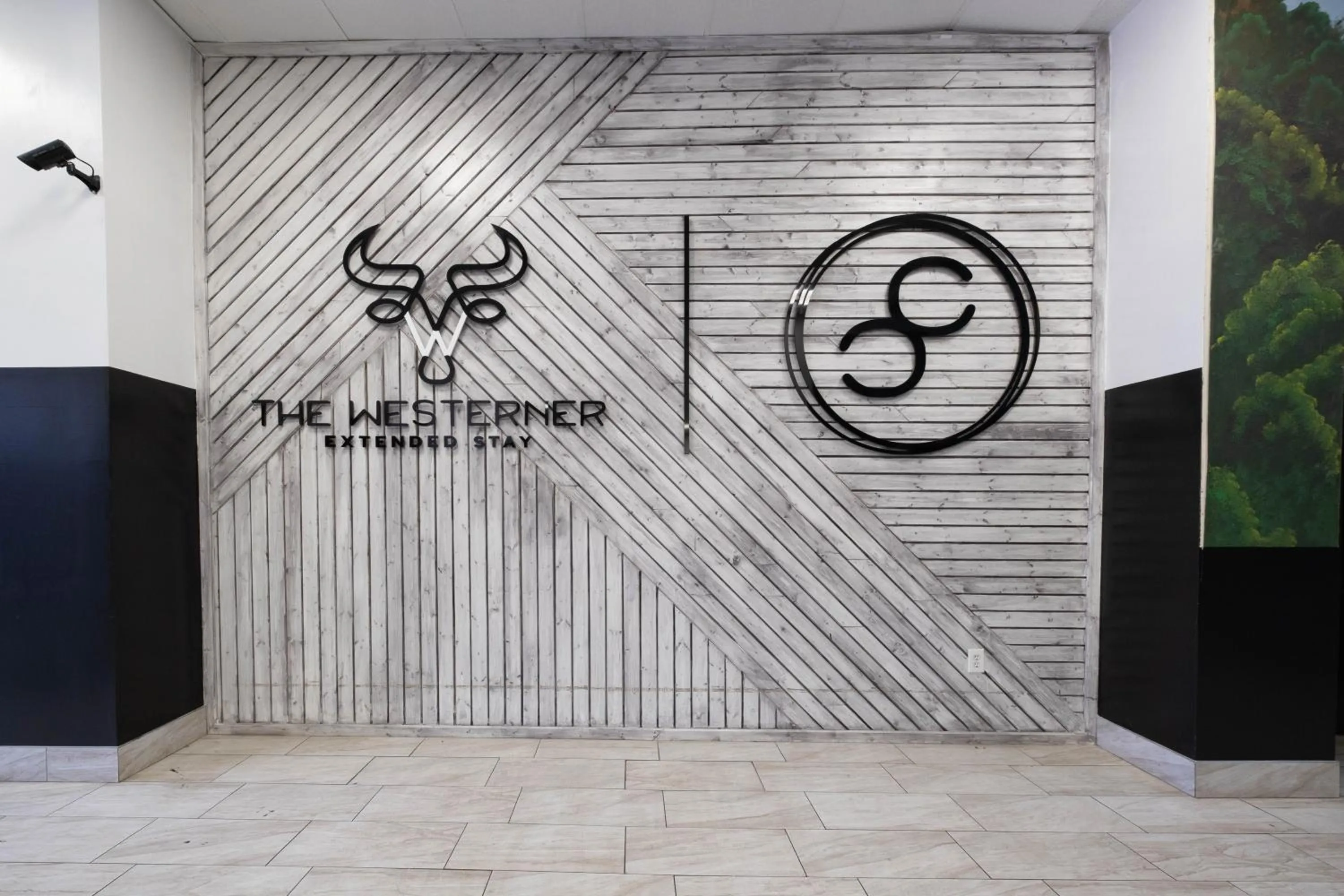 Property logo or sign in Cactus Cove Inn and Suites