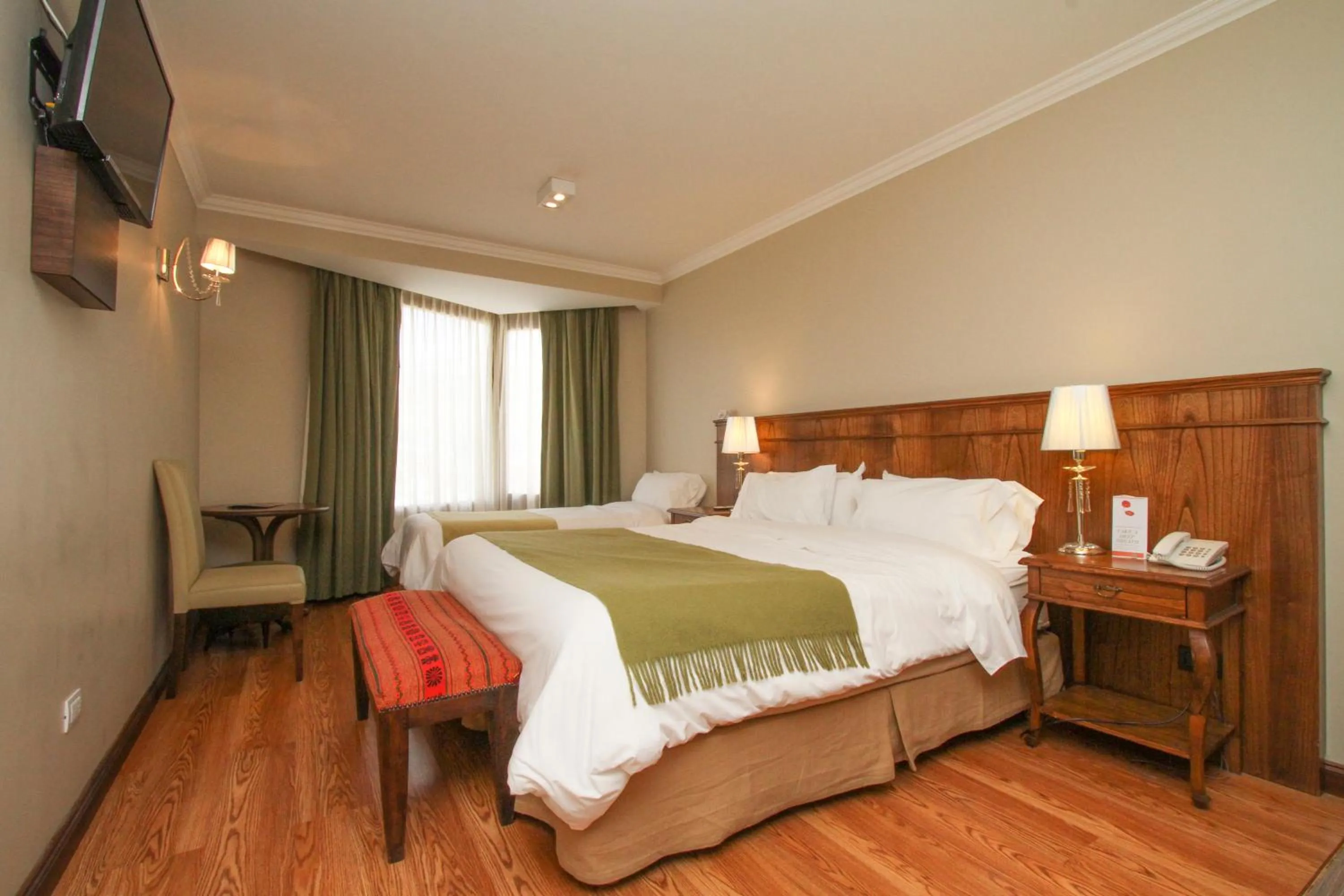 Bed in Chalten Suites Hotel