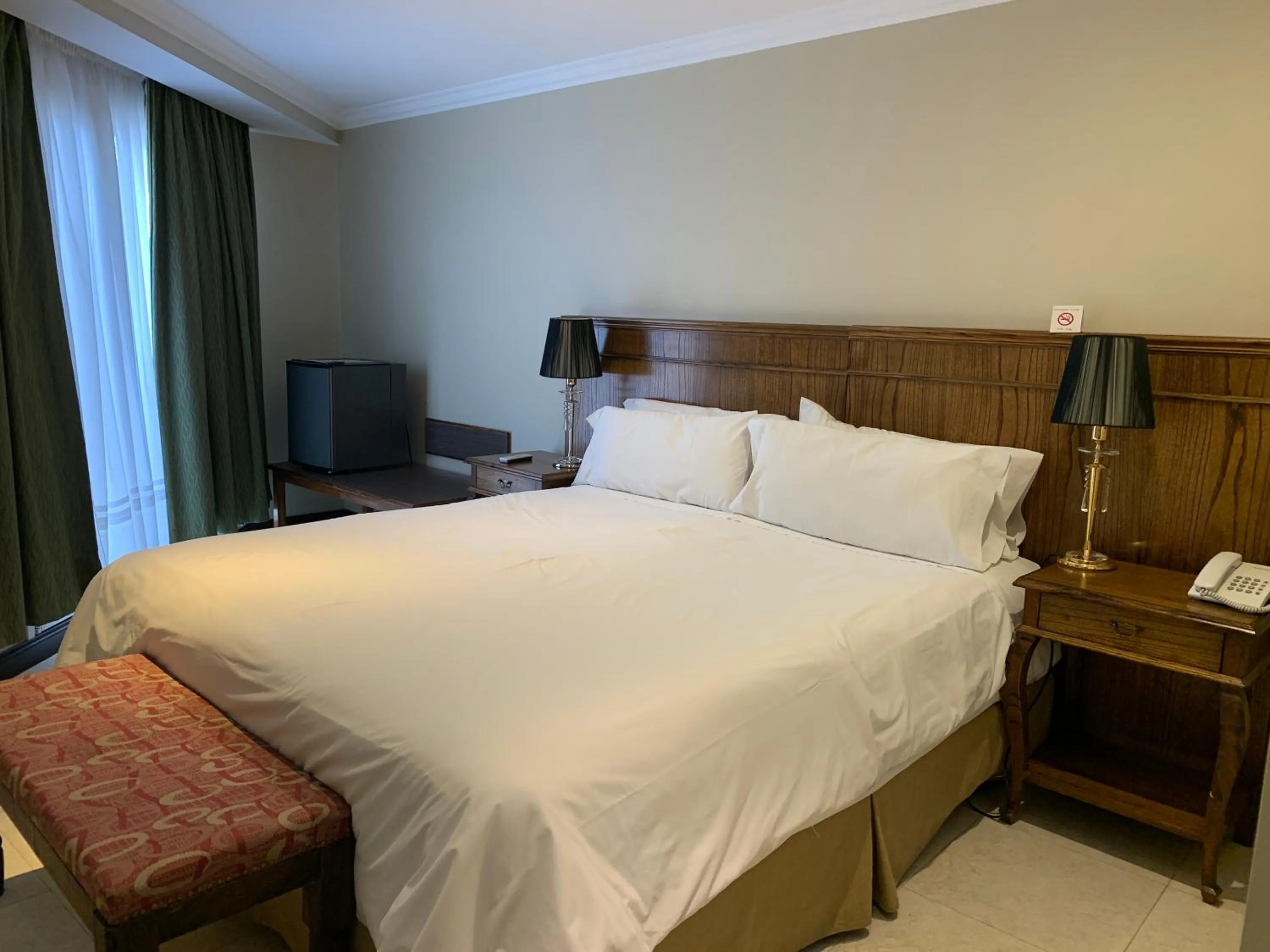 Bed in Chalten Suites Hotel