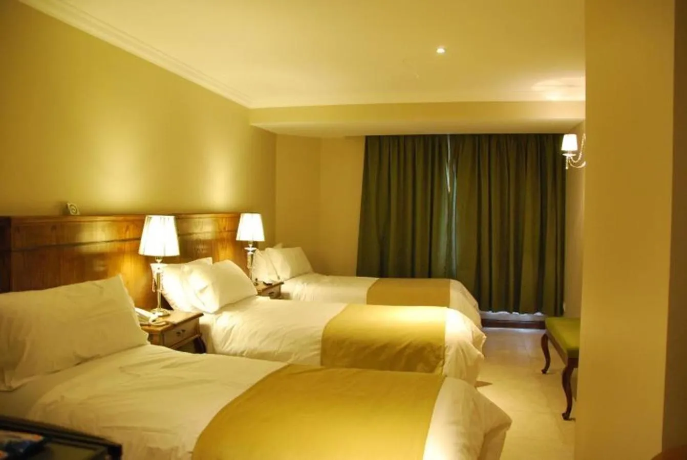 Bedroom, Bed in Chalten Suites Hotel