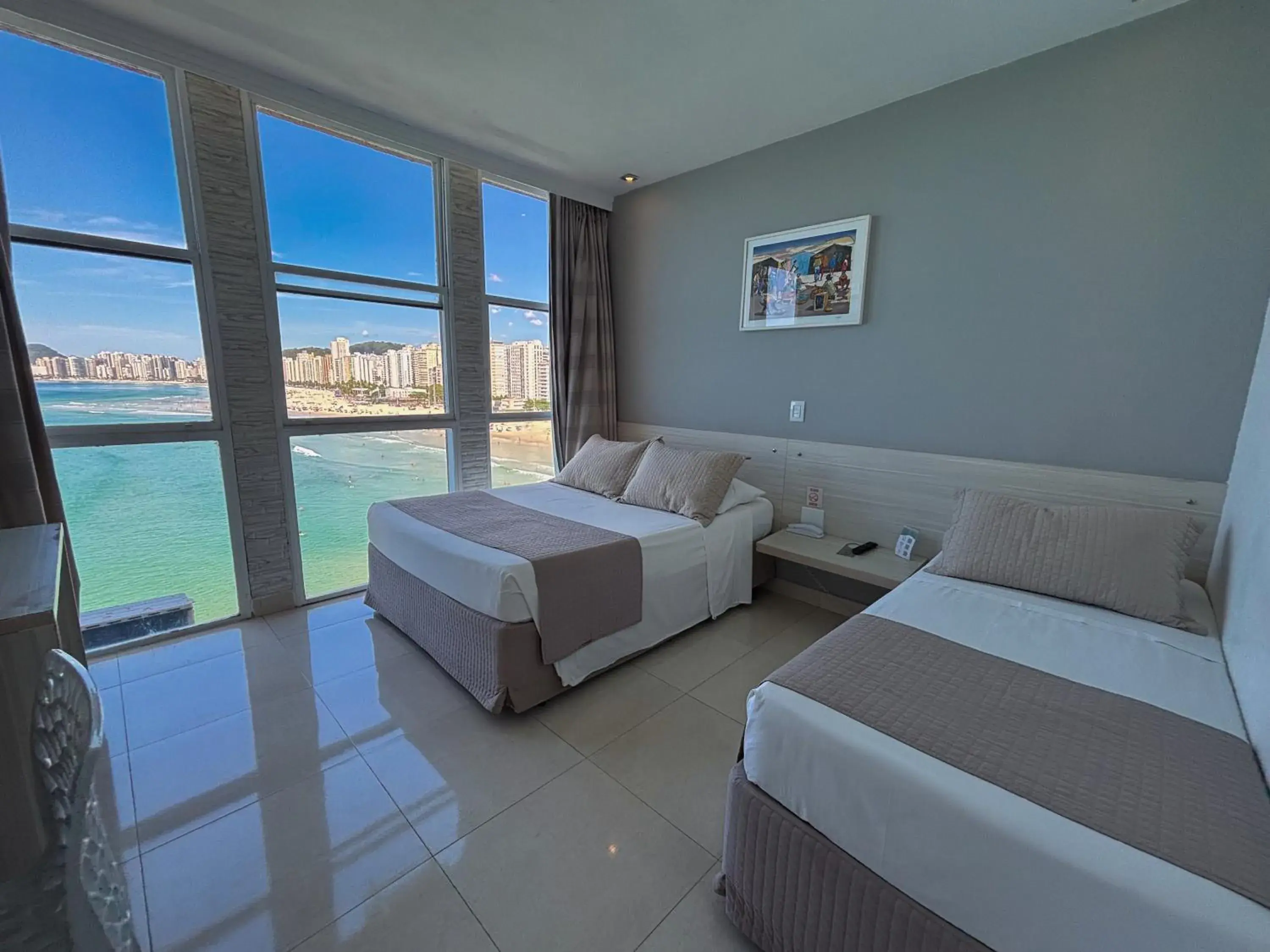 Comfort Triple Room with Sea View in Grand Hotel Guarujá - A sua Melhor Experiência Beira Mar na Praia! Comfort Triple Room with Sea View in Grand Hotel Guarujá - A sua Melhor Experiência Beira Mar na Praia!