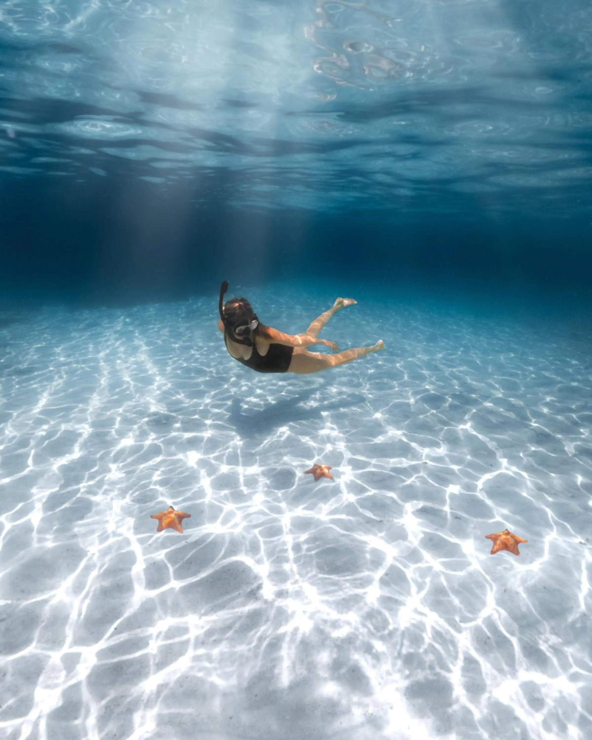 Snorkeling in Thatch Caye Resort a Muy'Ono Resort