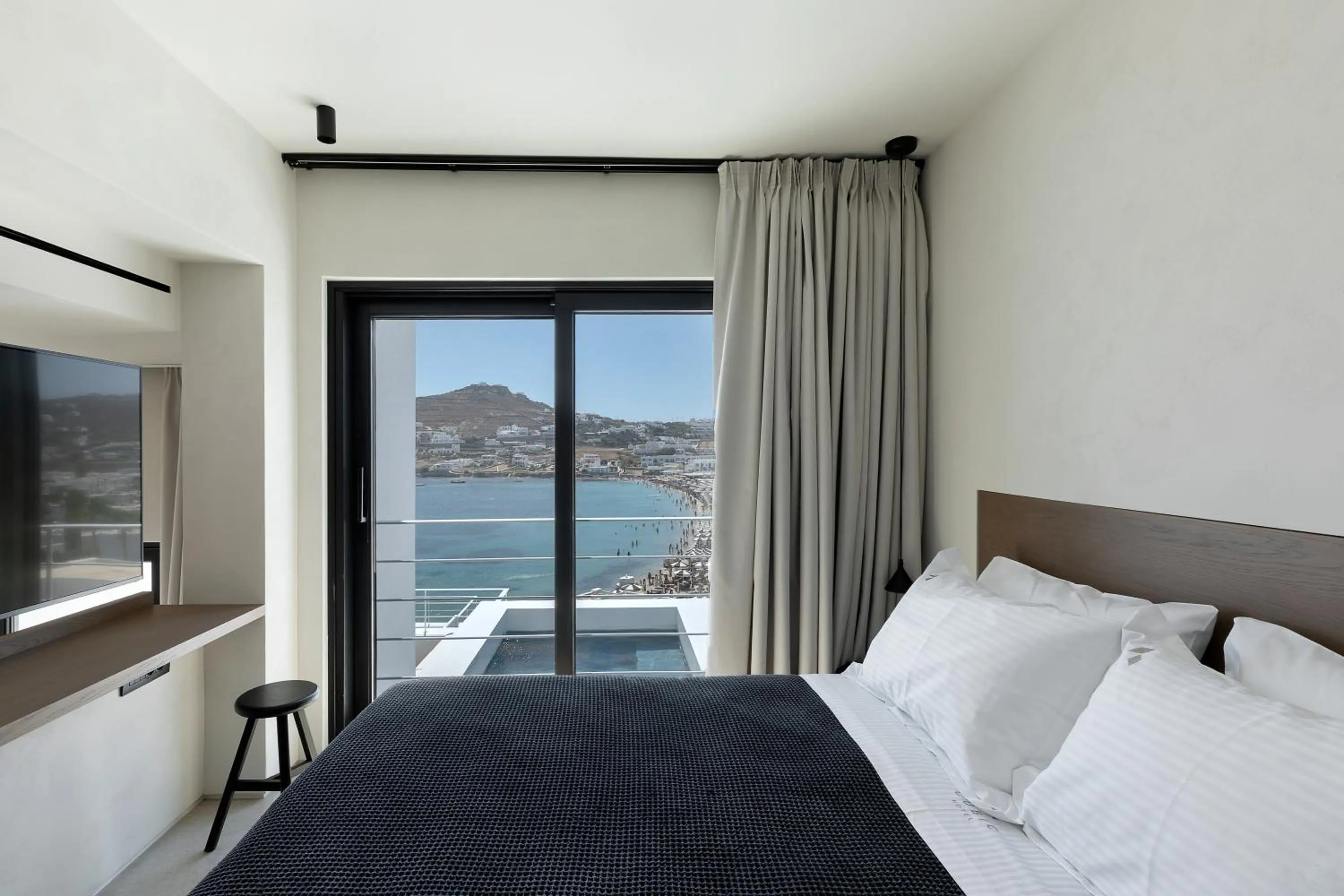 Bed in CUBIC Mykonos Seafront Design Suites