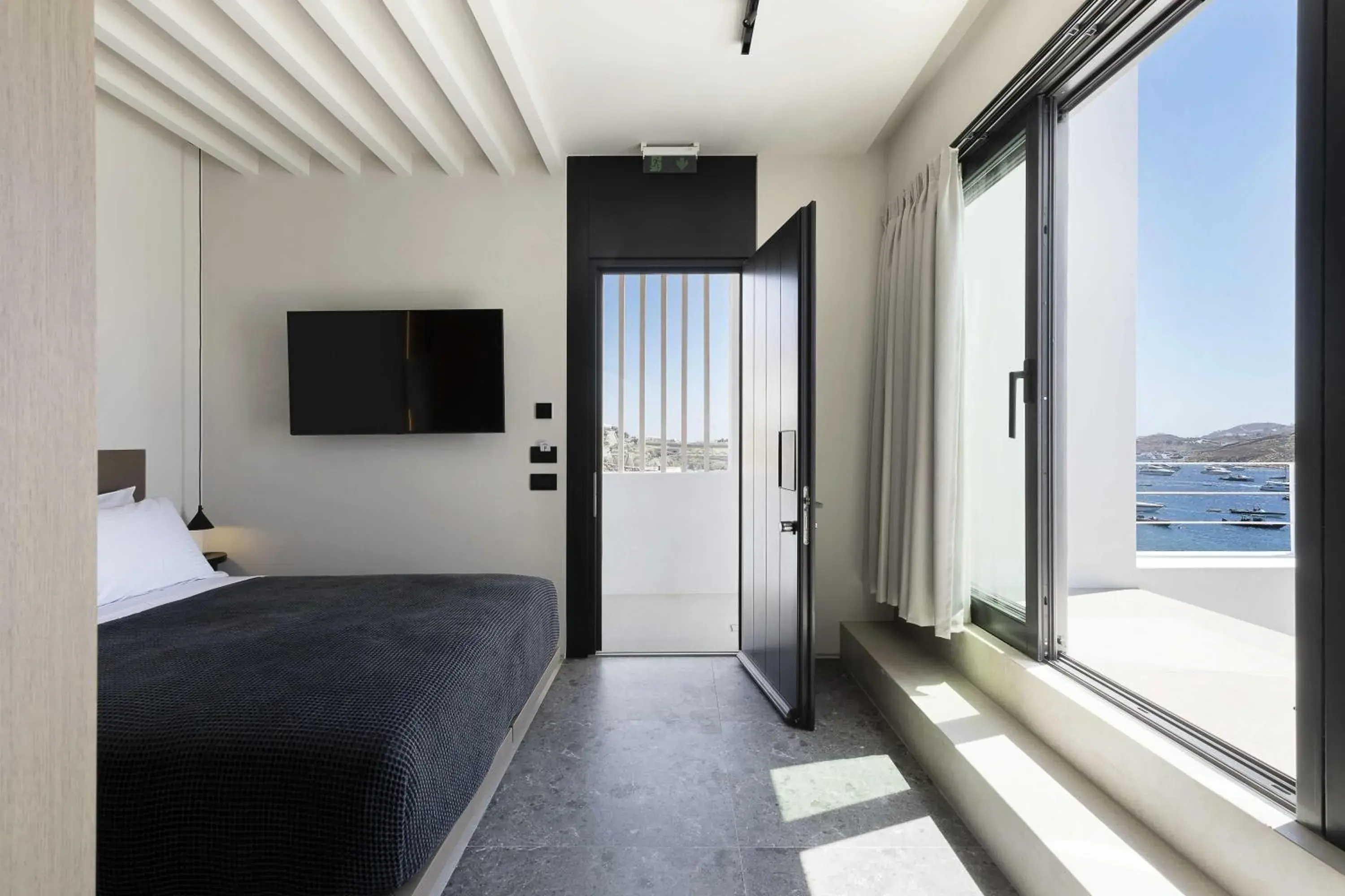 Honeymoon Suite with Panoramic Sea View & Mini Pool in CUBIC Mykonos Seafront Design Suites Honeymoon Suite with Panoramic Sea View & Mini Pool in CUBIC Mykonos Seafront Design Suites