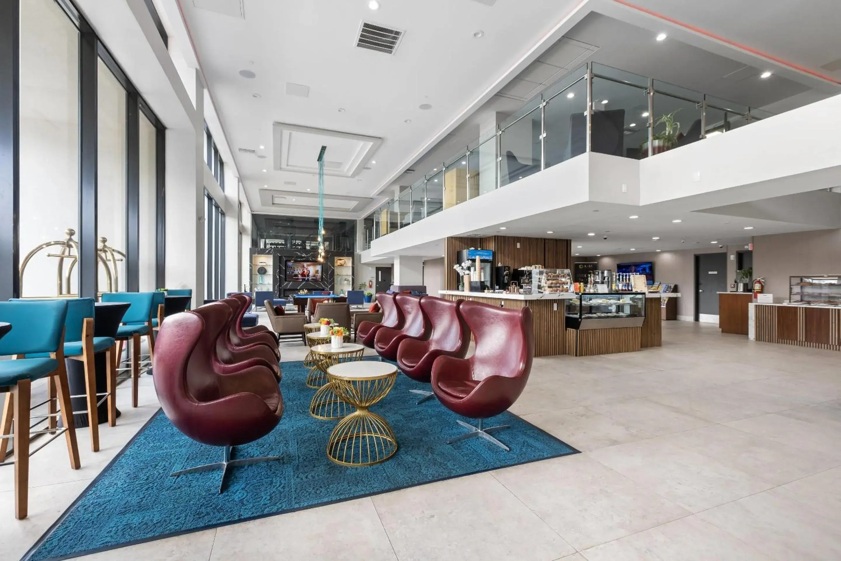 Lobby or reception in Cambria Hotel Orlando near Universal Theme Parks Lobby or reception in Cambria Hotel Orlando near Universal Theme Parks