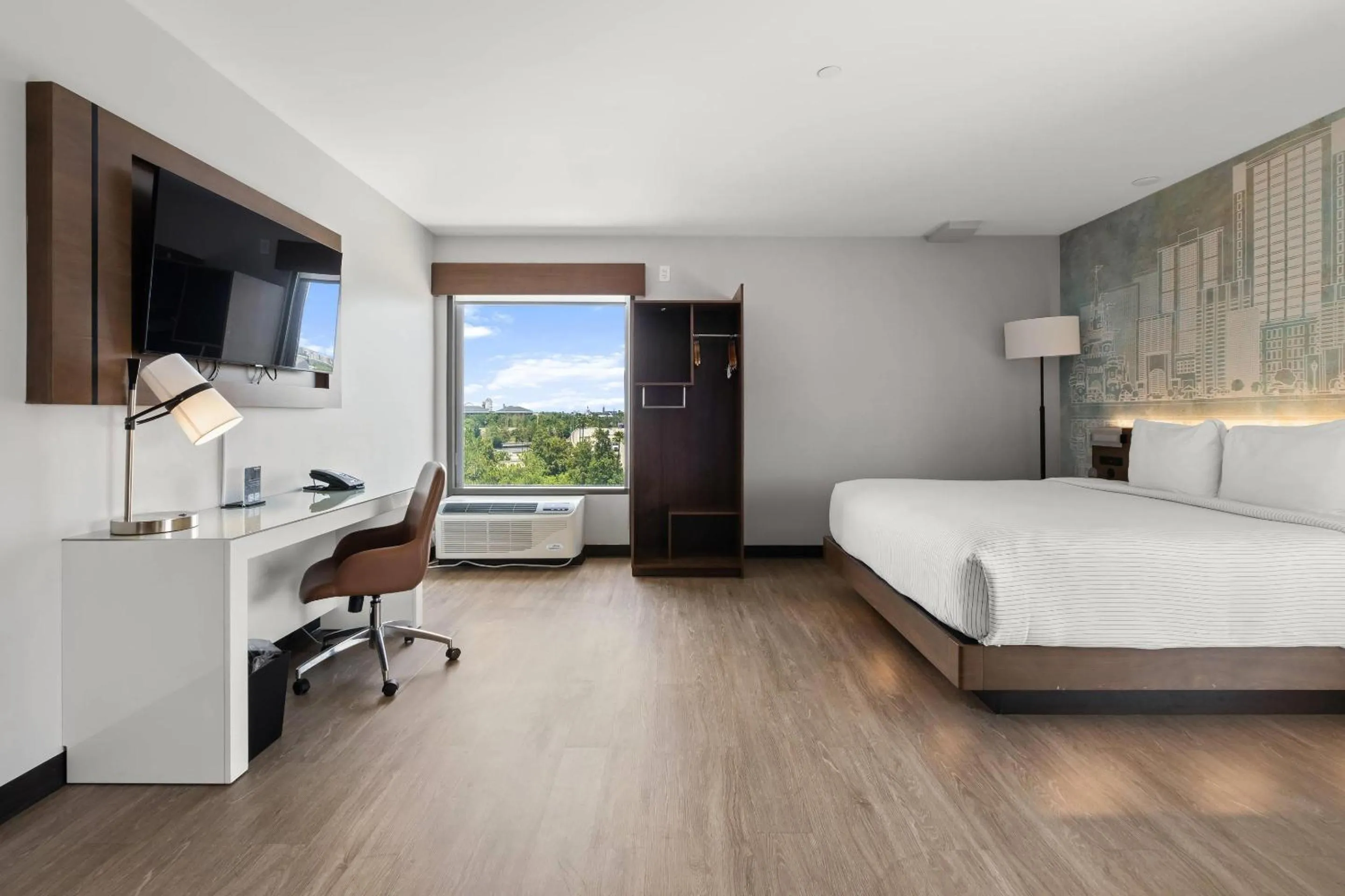 Bedroom, Bed in Cambria Hotel Orlando near Universal Theme Parks