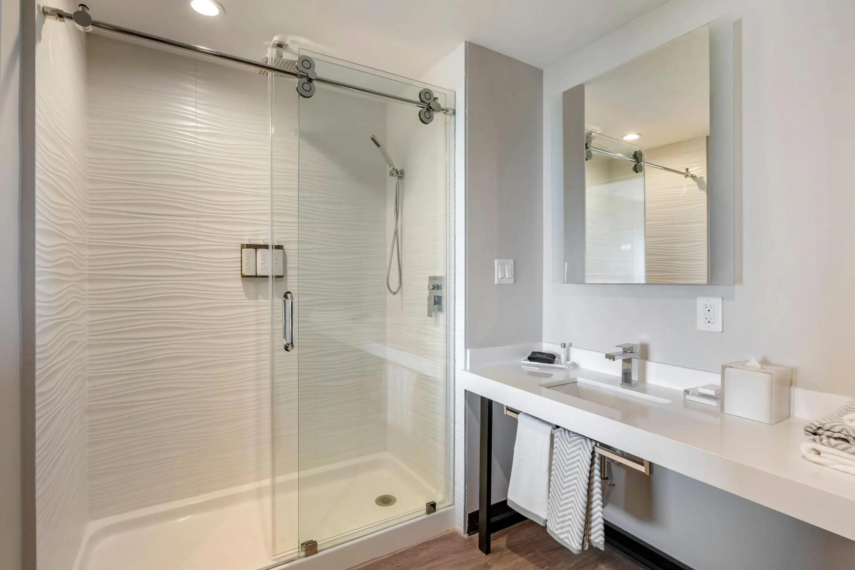 Bedroom in Cambria Hotel Orlando near Universal Theme Parks