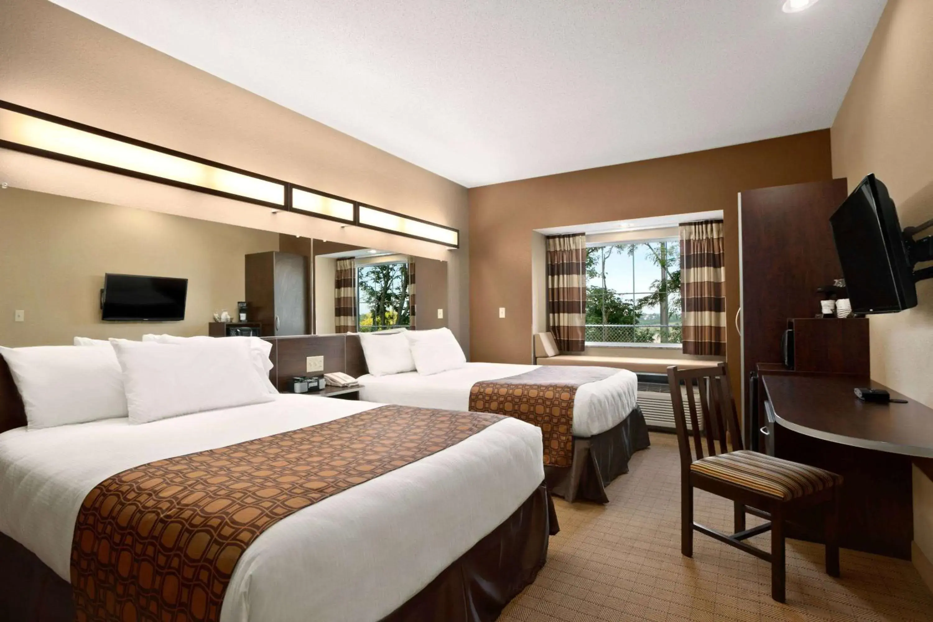 Photo of the whole room, Bed in Microtel Inn & Suites by Wyndham St Clairsville - Wheeling Photo of the whole room, Bed in Microtel Inn & Suites by Wyndham St Clairsville - Wheeling