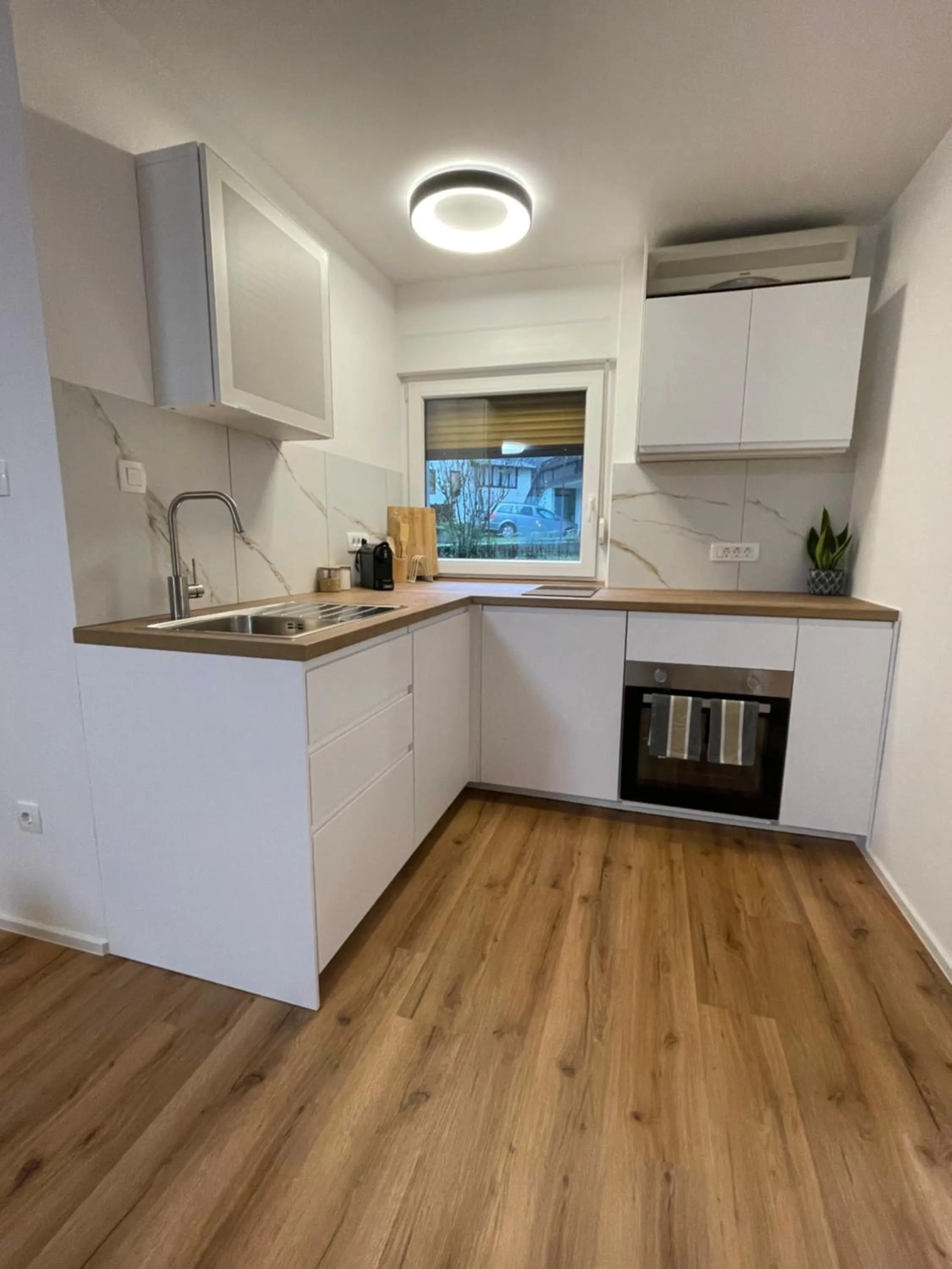 Kitchen or kitchenette in Apartma Guide 360